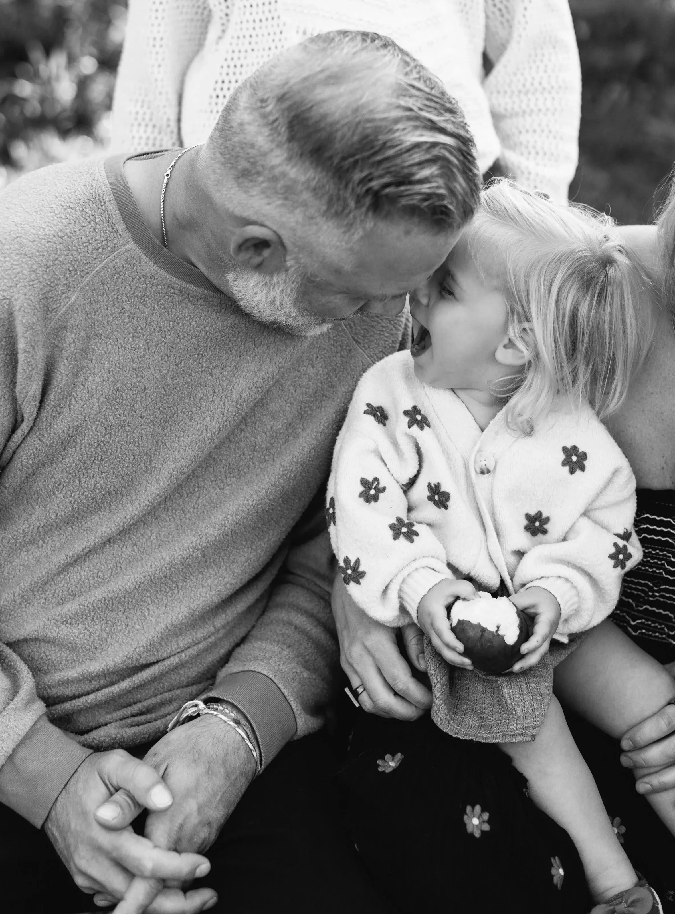 father and daughter laughing during a fall mini session