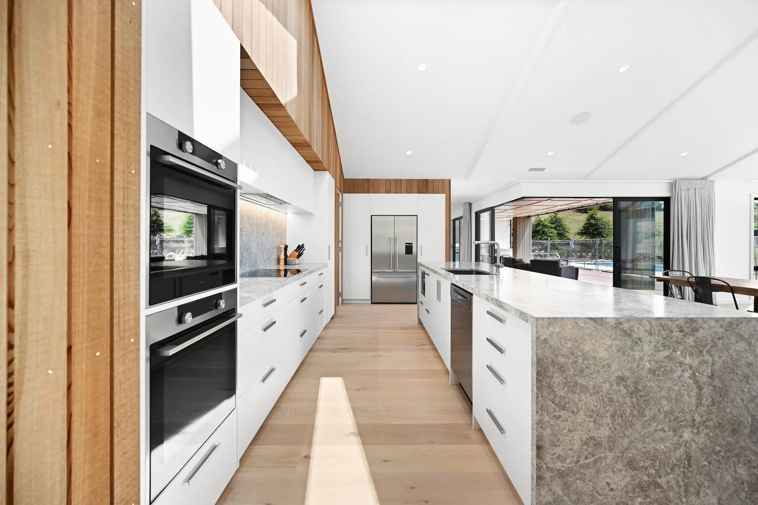 Modern Kitchen renovation by Waikato builders MDB Homes with custom cabinetry and open-plan design