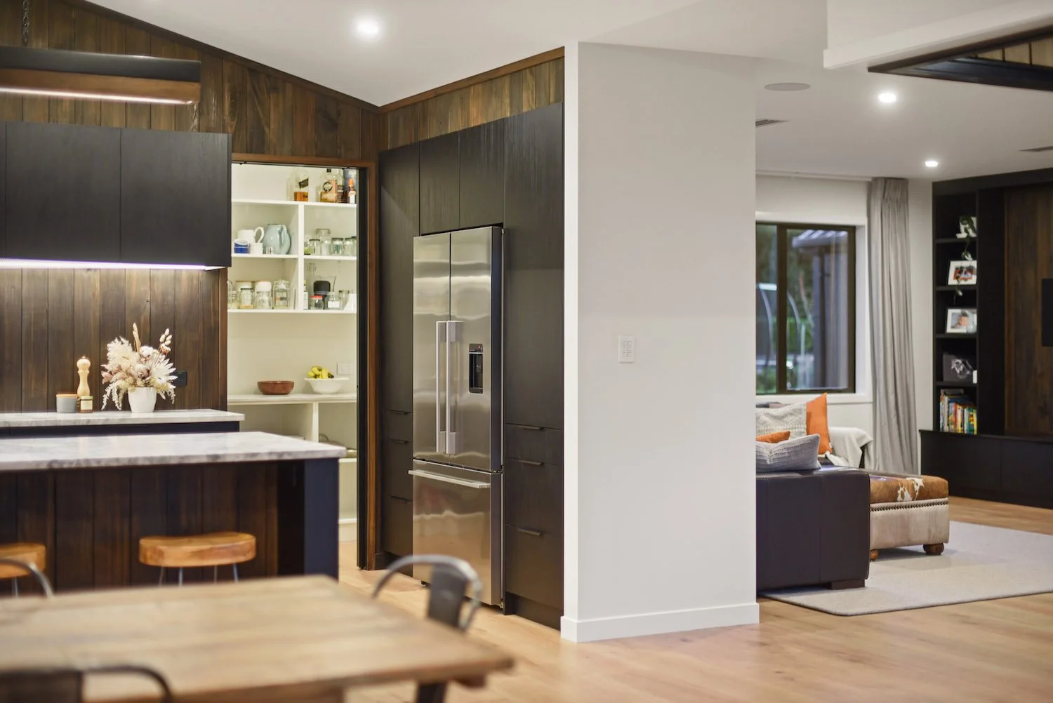 Home renovation in Waikato showing modern kitchen and open-plan living completed by MDB Homes