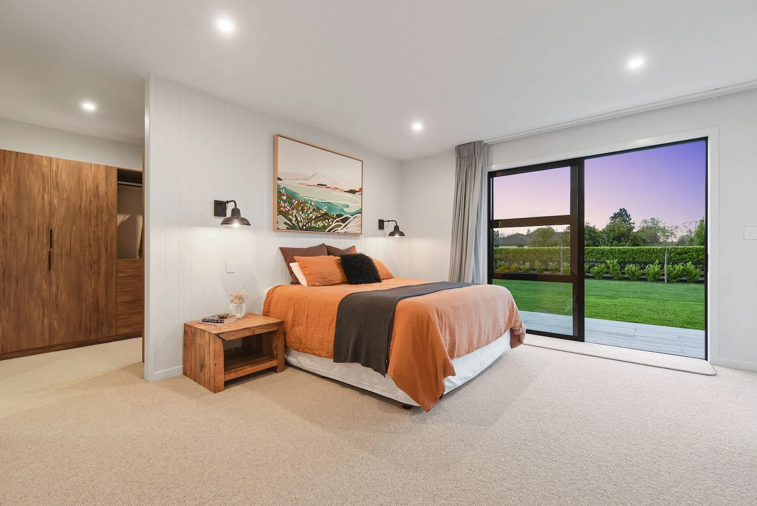Modern bedroom in a lifestyle home Waikato built by MDB Homes with views over rural property