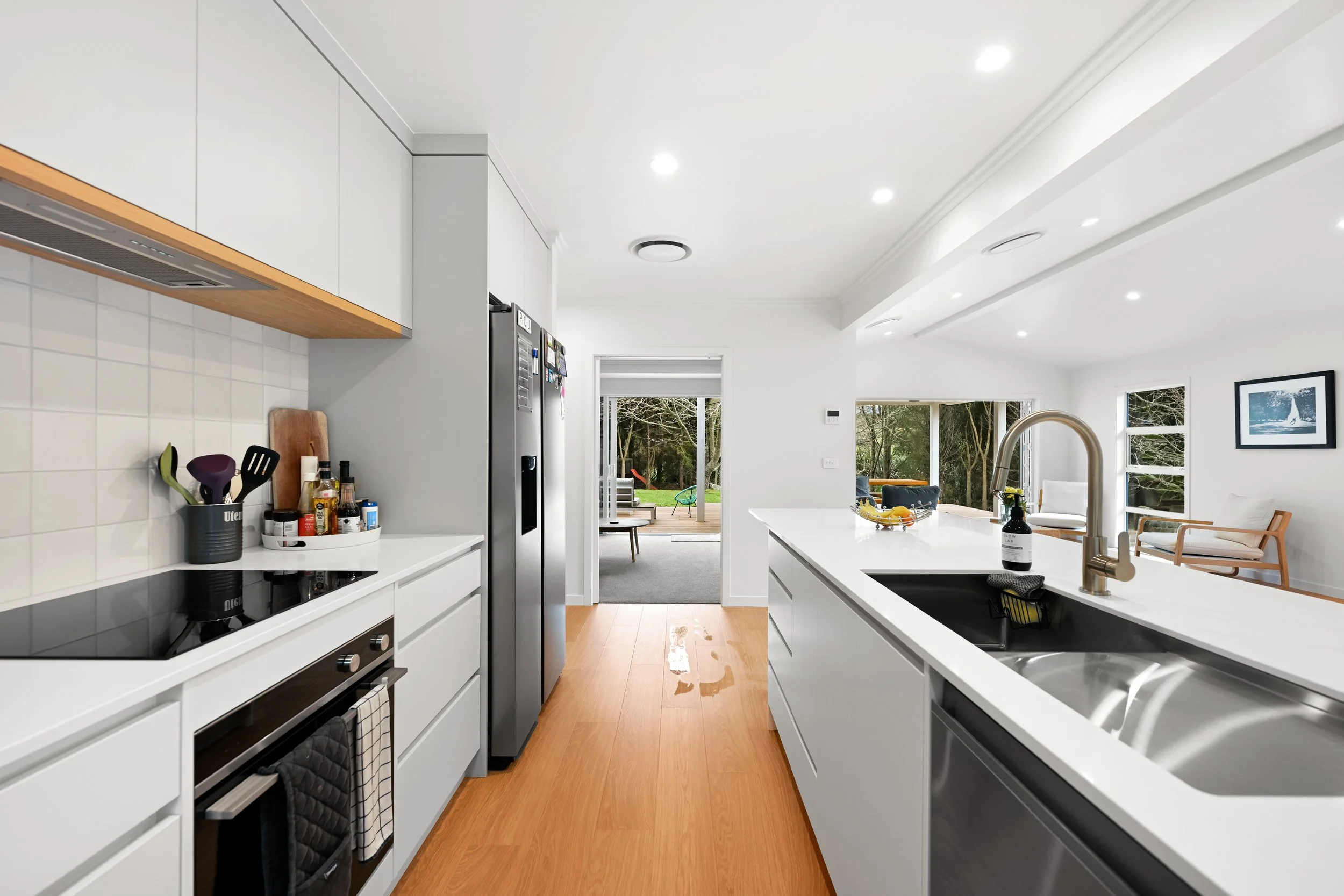 modern kitchen in hamilton home built by residential builders, showcasing quality craftsmanship and clean interior finishes