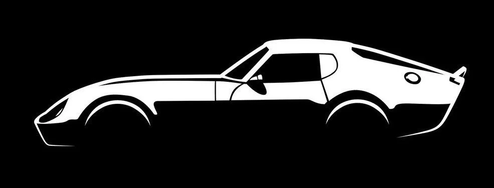 Silhouette of a sports car with a sleek, angular design against a black background.