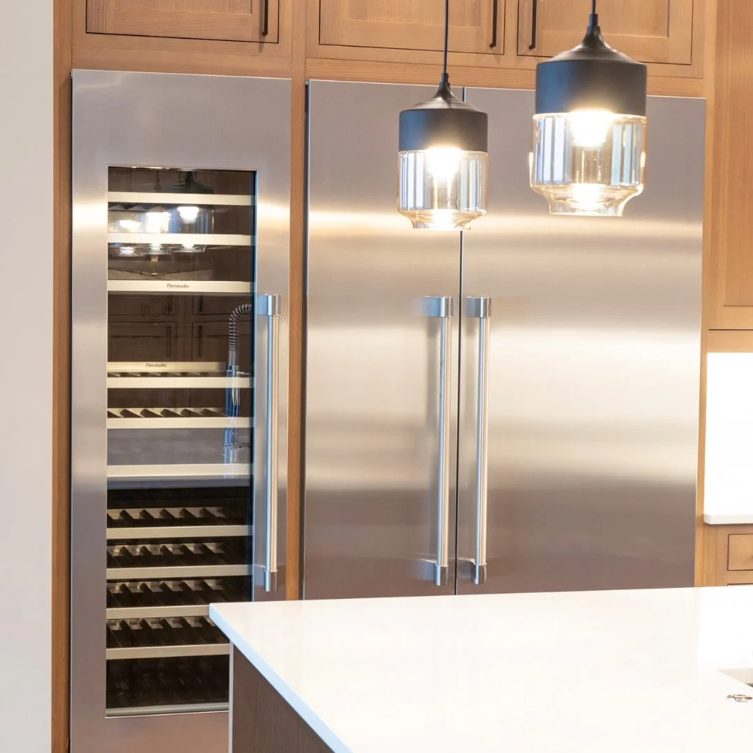 Luxury is in the details 🍷❄️ This pair of 7-foot tall Thermador fridge and wine fridge, seamlessly built into light wood cabinetry, redefines sophistication and functionality.

📸 Showcasing craftsmanship like this is my specialty. Let&rsquo;s work 