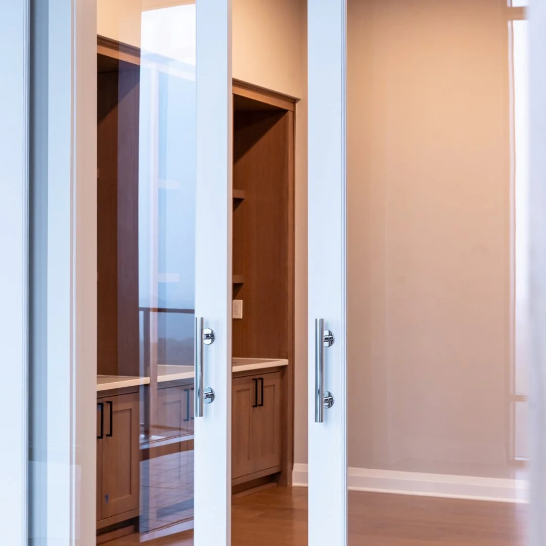 A space for work, play, or relaxation 💼✨ This beautifully designed den at 99 West Paces features built-in cabinet storage and wood-framed glass sliding double doors for an unparalleled blend of style and privacy.

📸 Capturing the spaces where luxur