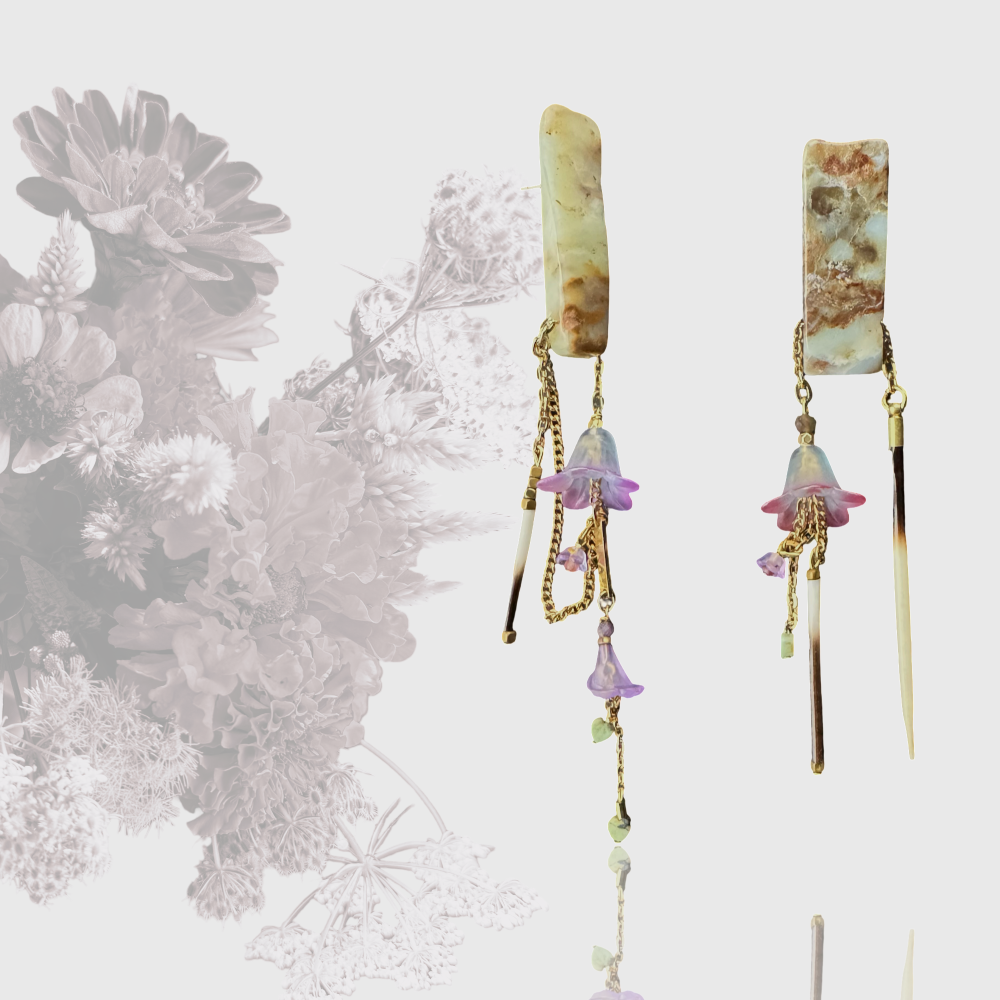 Rustic mannequin displaying layered necklaces with natural stone pendants and chain accents, surrounded by floral illustrations.