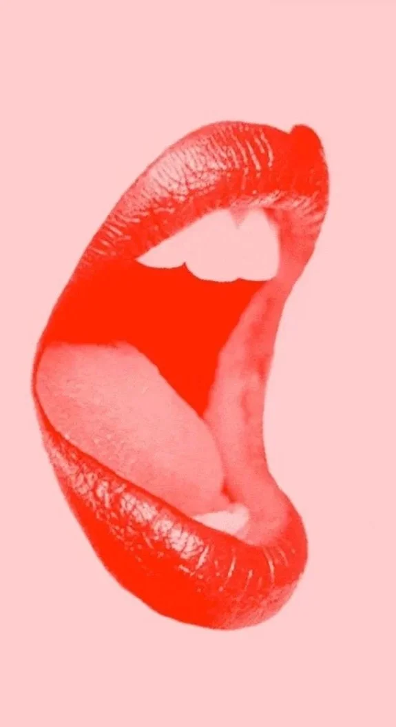Close-up of red lips with an open mouth, showing teeth and tongue, against a pink background.
