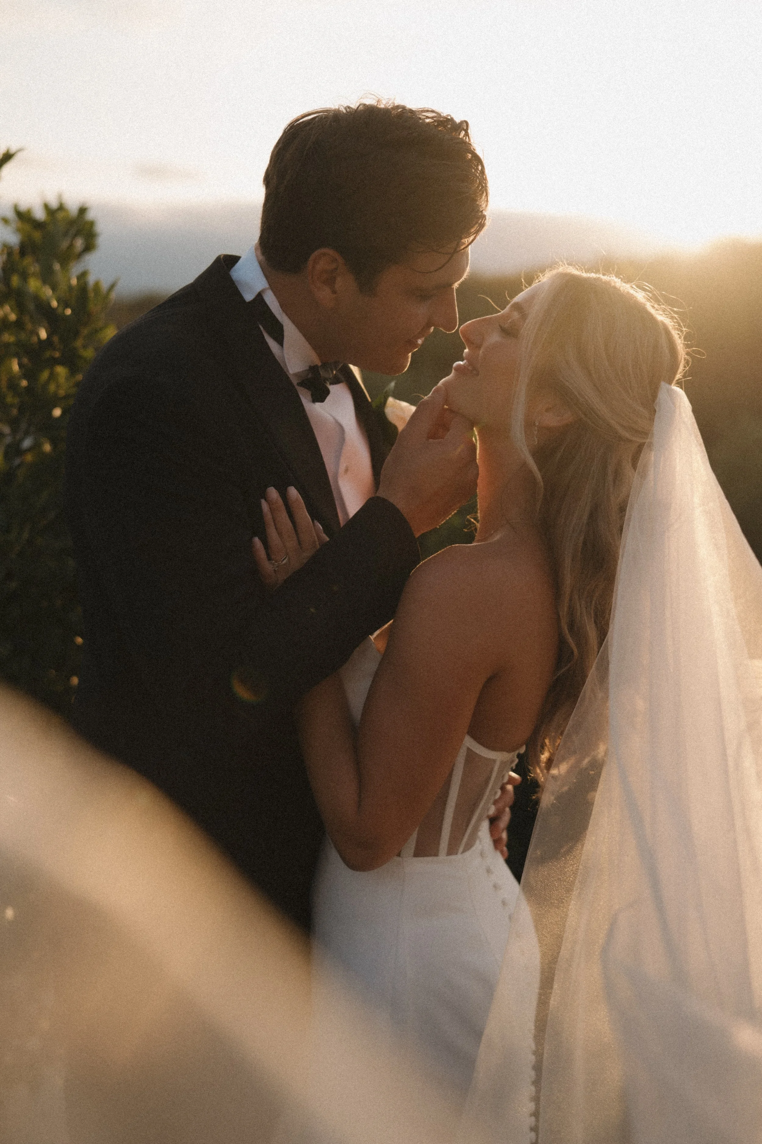 Golden hour bride and groom portrait at Jeune Perche in Oceanside by Jennifer Noelle