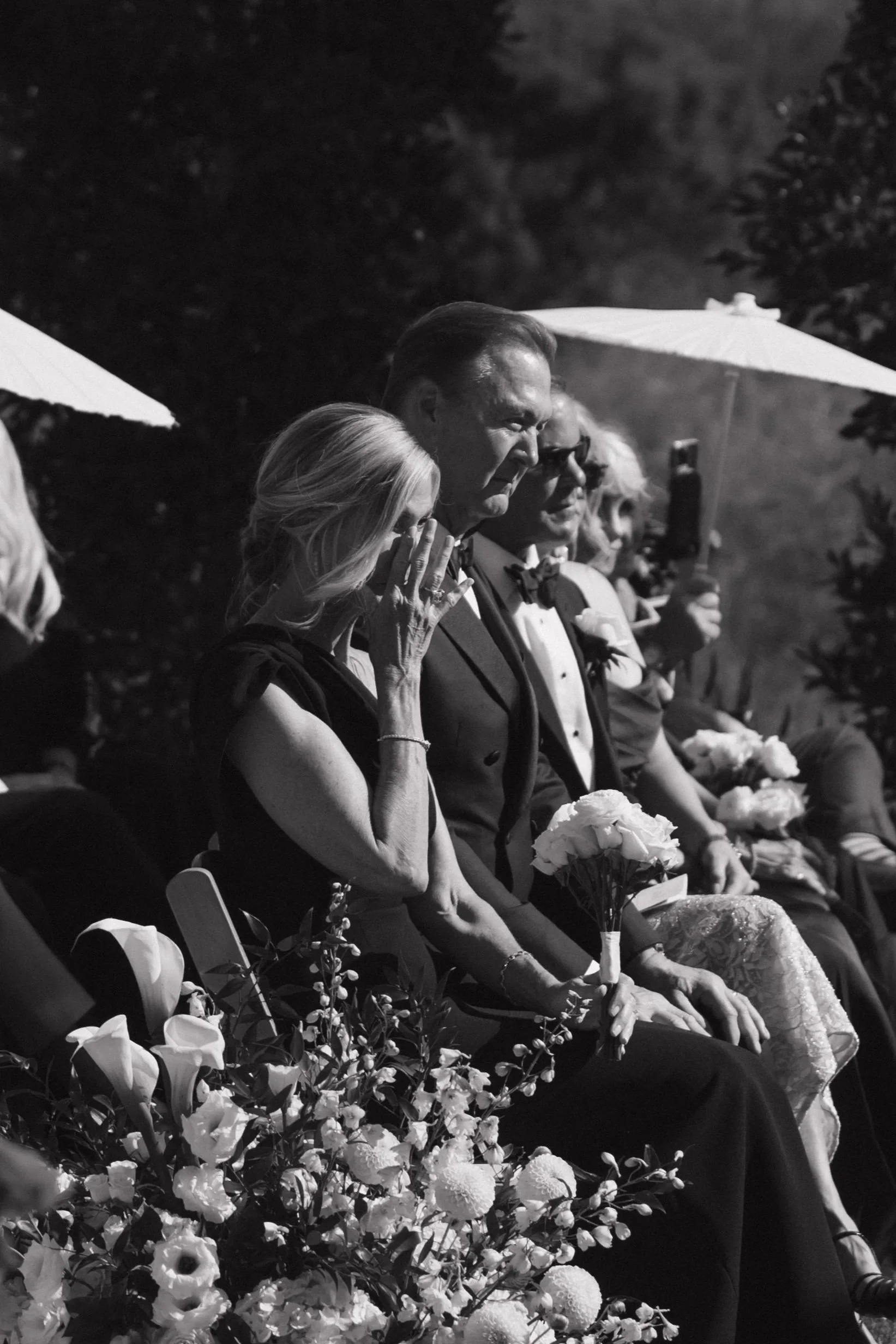 Emotional wedding ceremony photograph of family at Jeune Perche in Oceanside by Jennifer Noelle