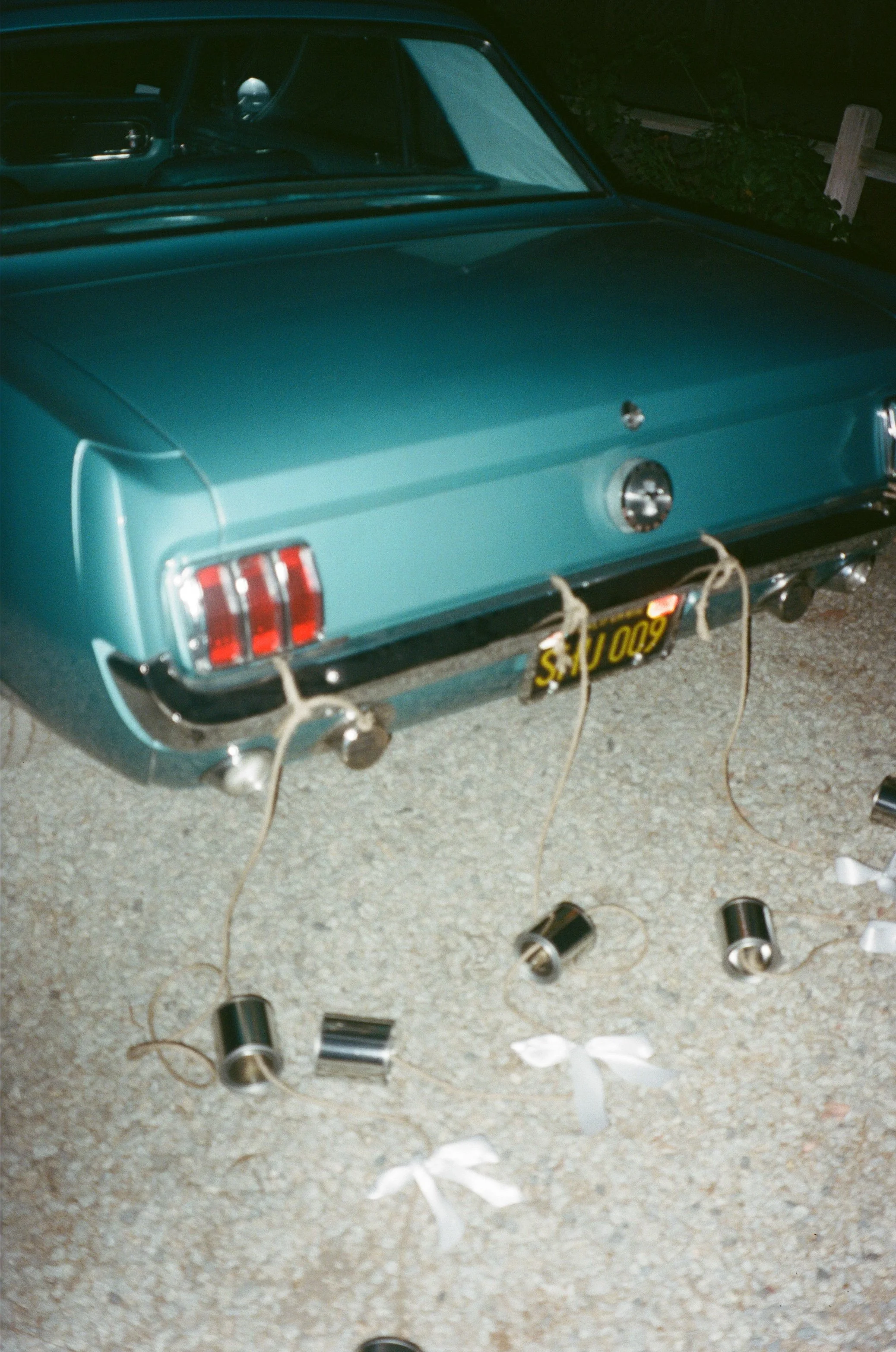 Reception table details photographed with flash lighting at wedding reception captured on film at temecula wedding venue lake oak meadows