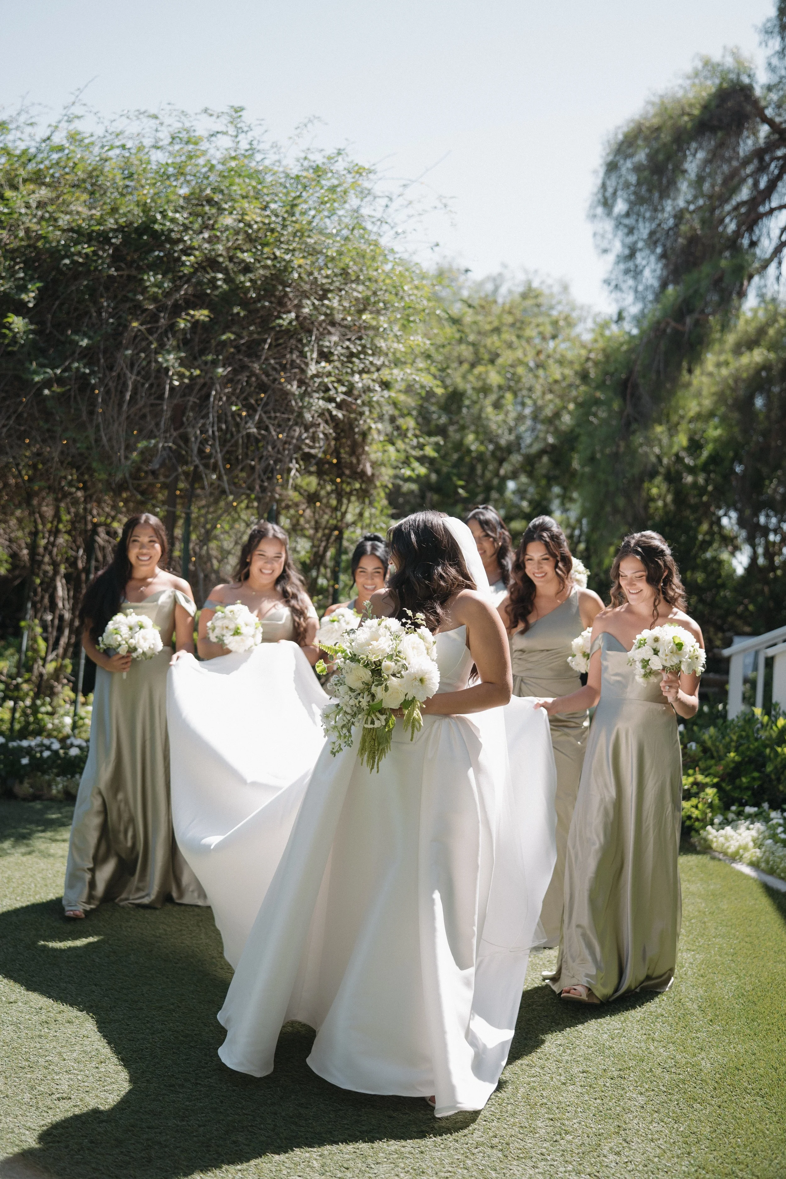 Garden wedding photograph of Bride and bridesmaids at Green Gables Wedding Estate