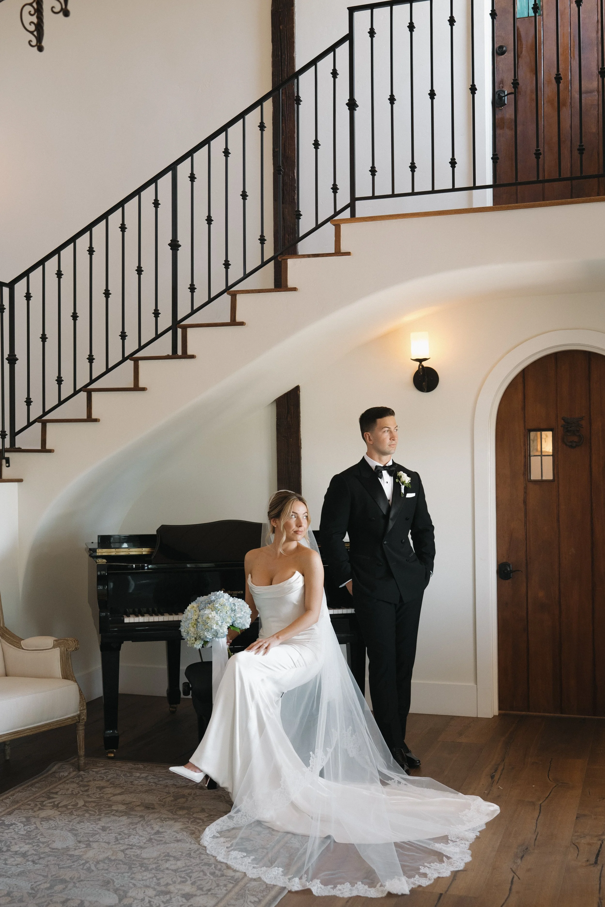 Bride and groom portrait with piano at Jeune Perché in Oceanside, California by Jennifer Noelle