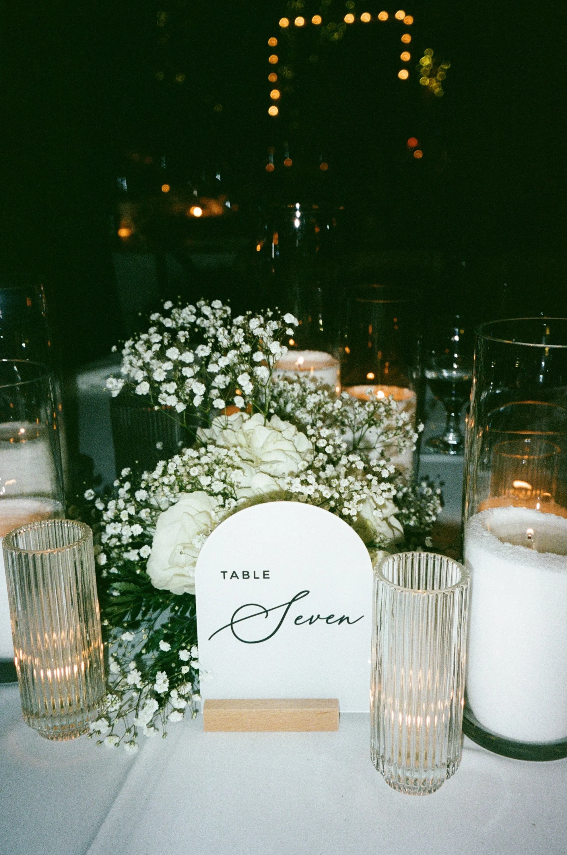 Reception table details photographed with flash lighting at wedding reception captured on film