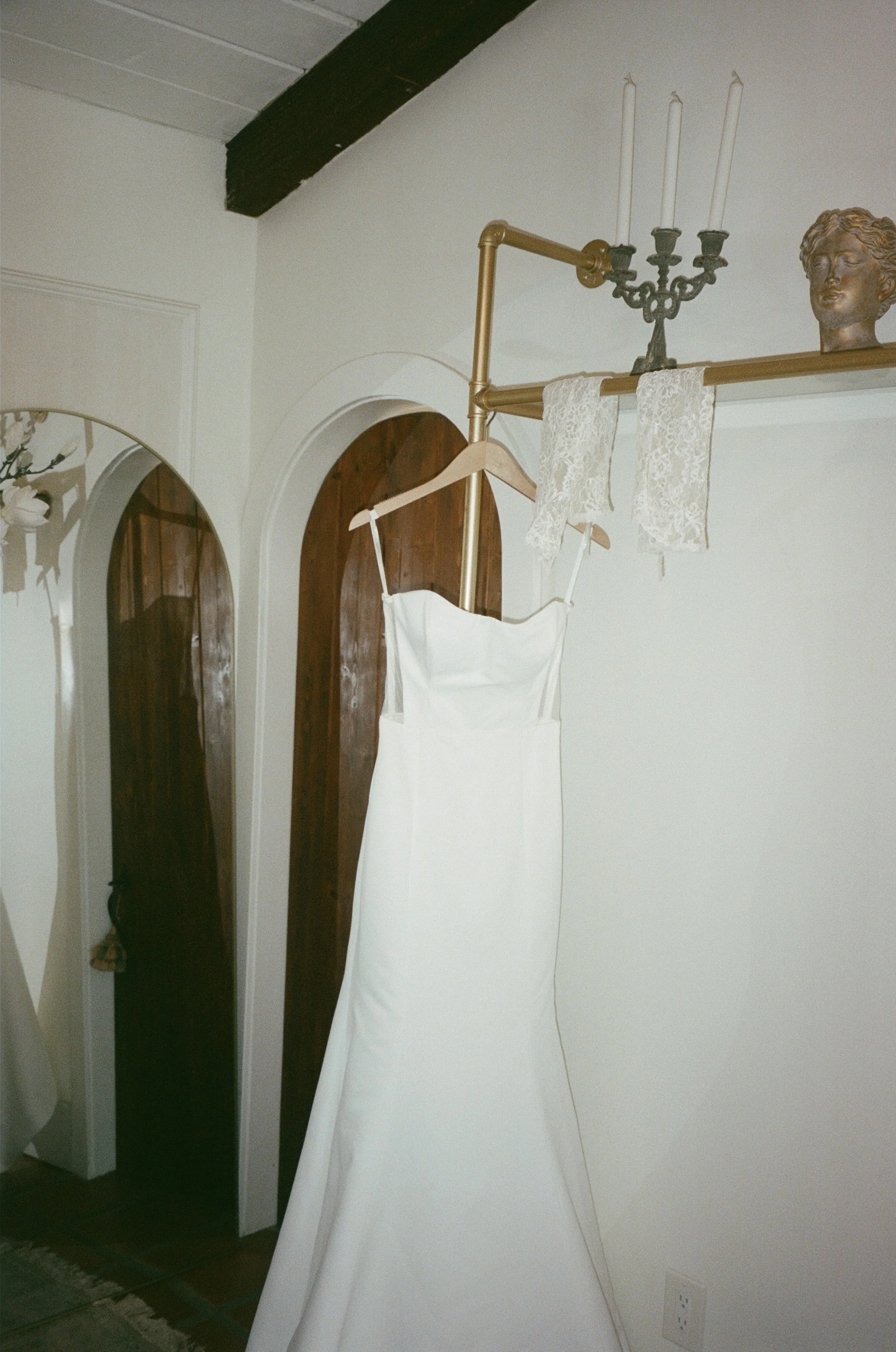 Timeless film wedding detail of the bride’s dress and accessories