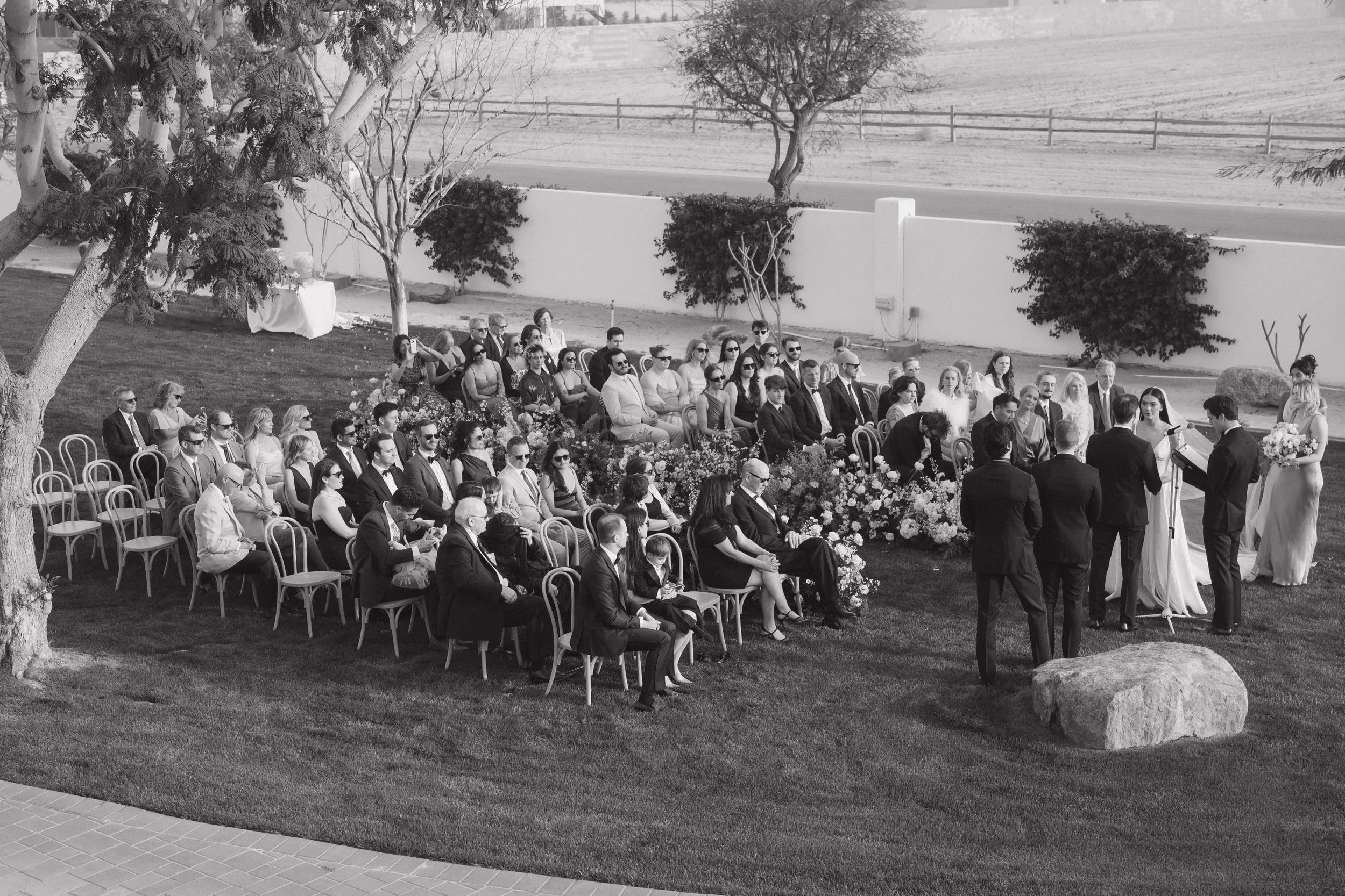 Wedding ceremony at Zenda Estate in Palm Springs in black and white by Jennifer Noelle
