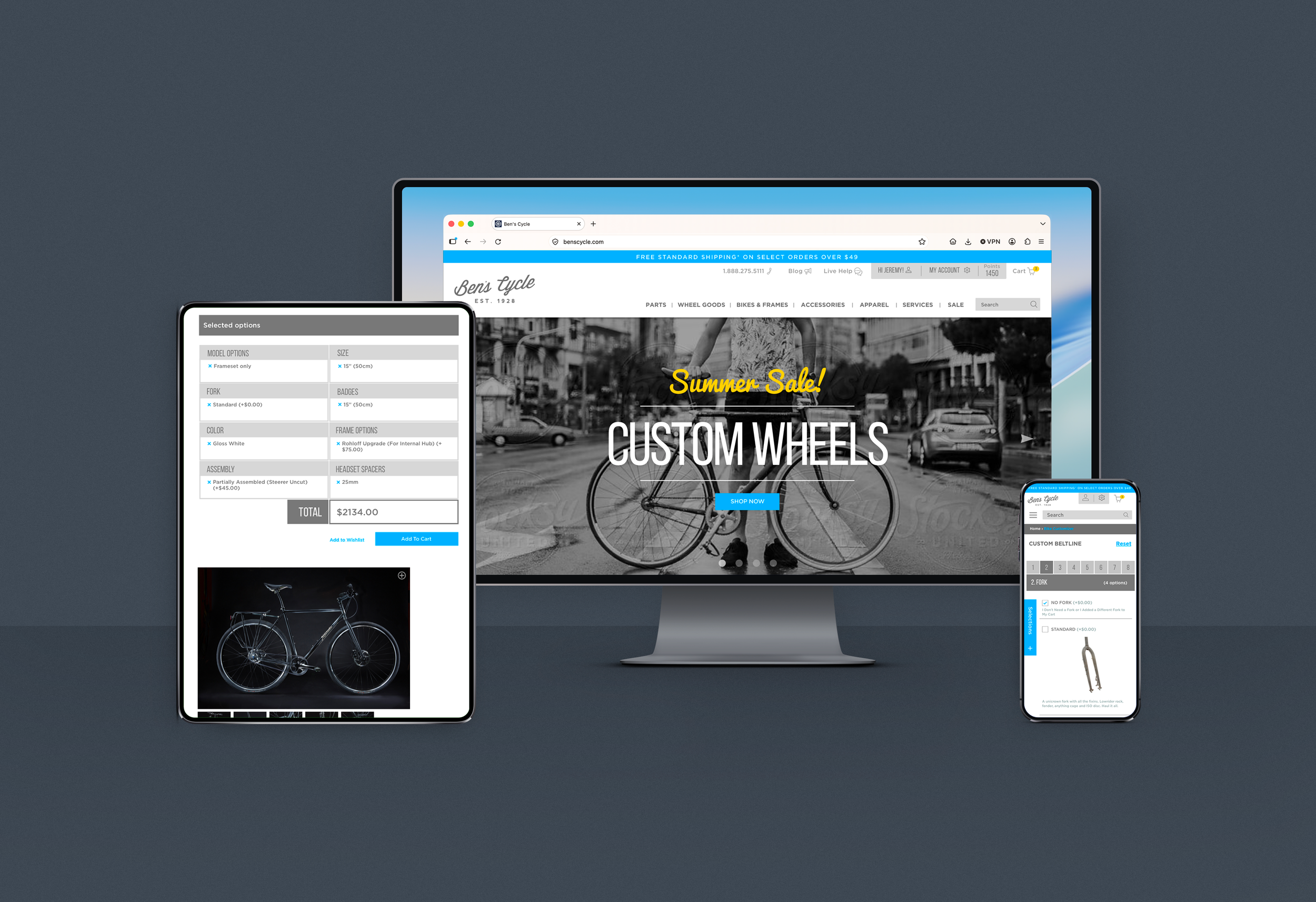 A computer monitor showing an online bike shop website with a promotional summer sale for custom wheels, and two mobile devices displaying bike product options and specifications.
