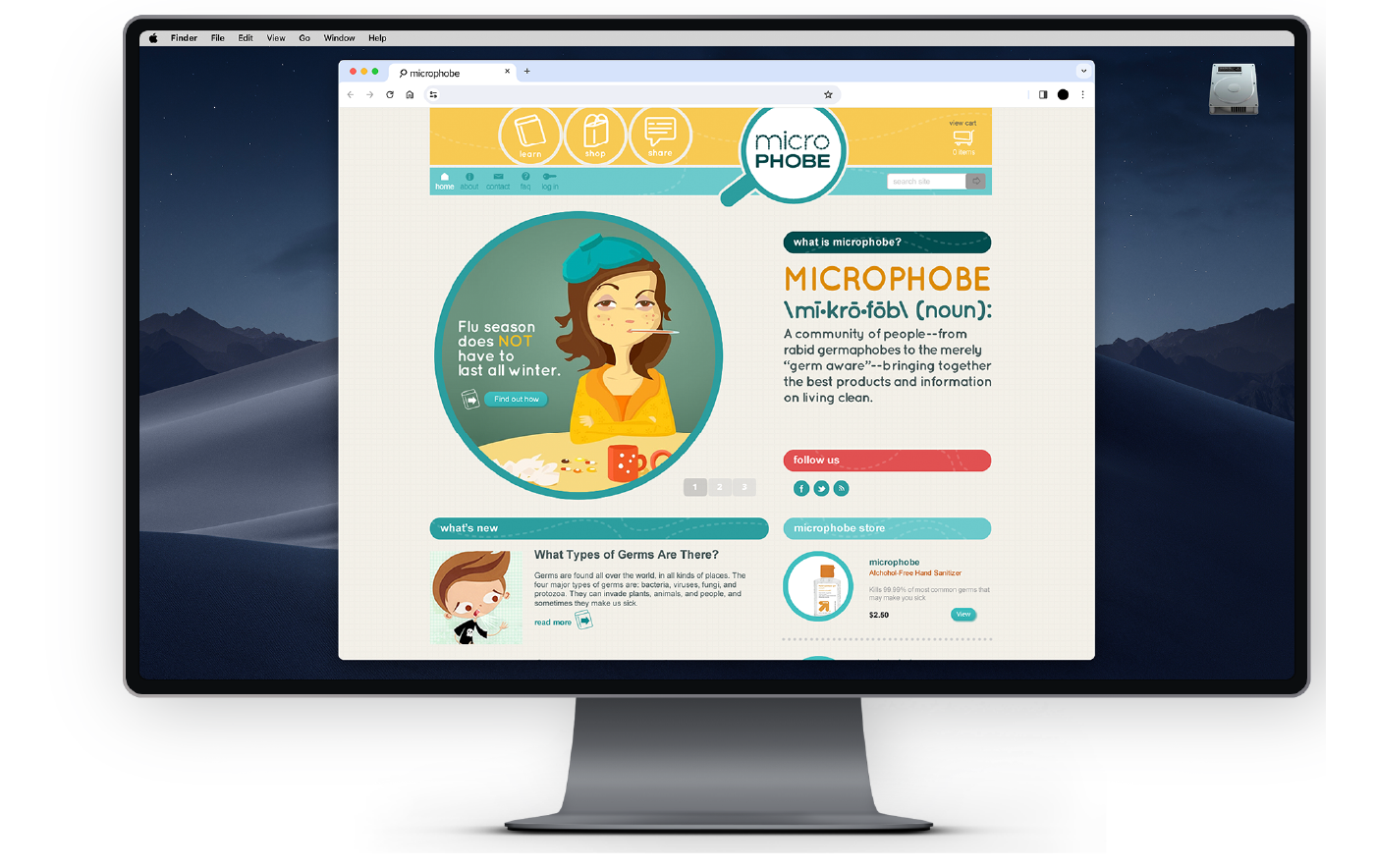 Screenshot of a website titled 'microPHOBE,' featuring cartoon illustrations and information about germs and hygiene products, with a computer monitor displaying the website.