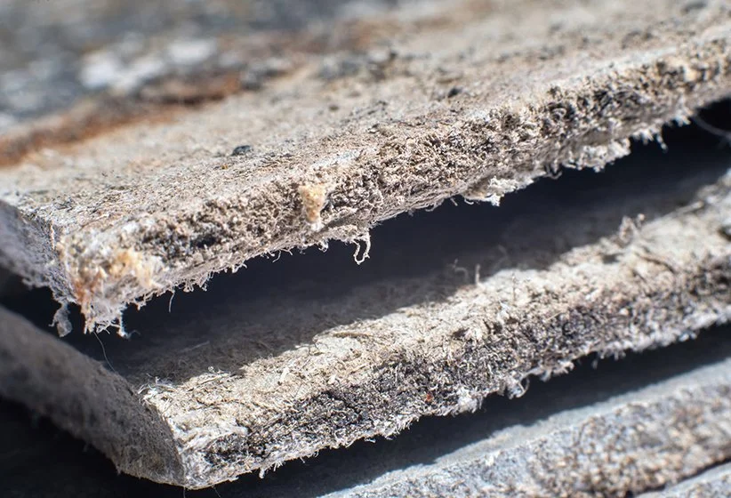 Asbestos bonded or friable