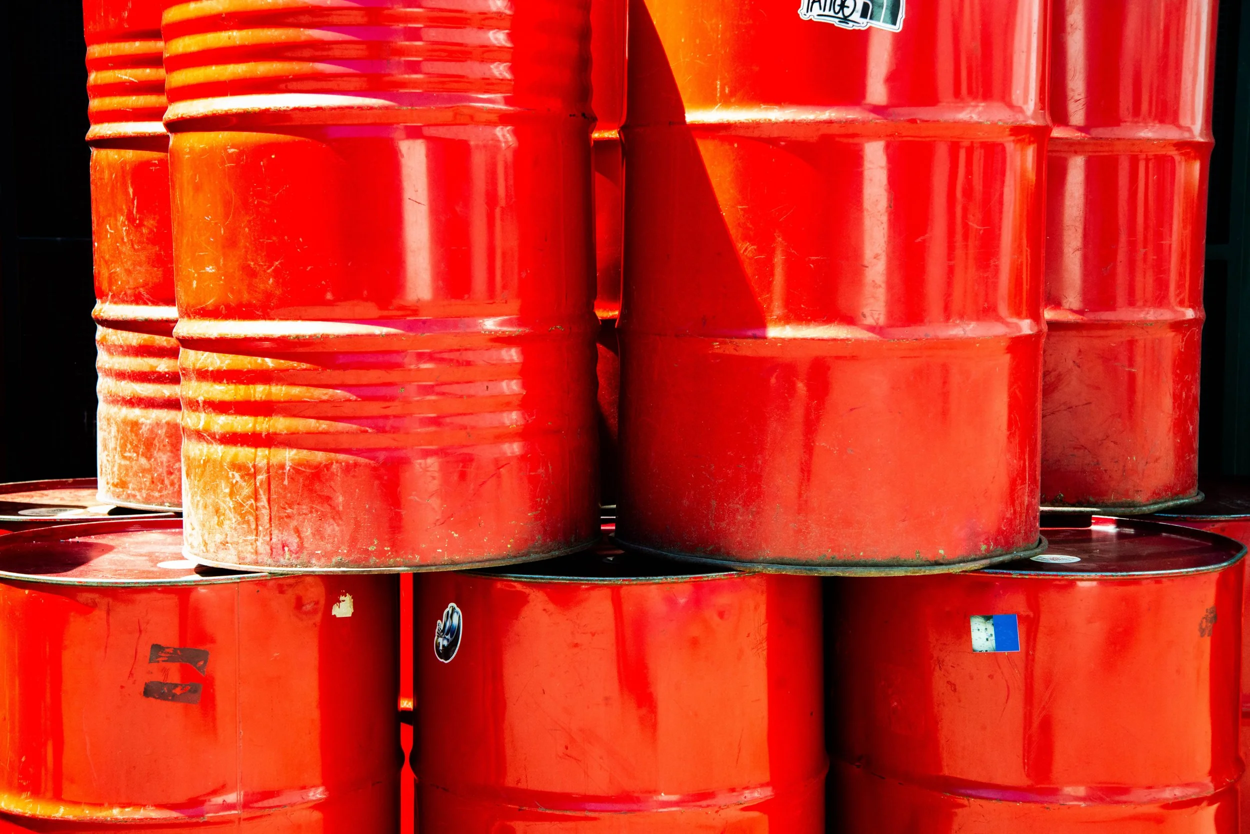 Old chemical waste containers with no labelling