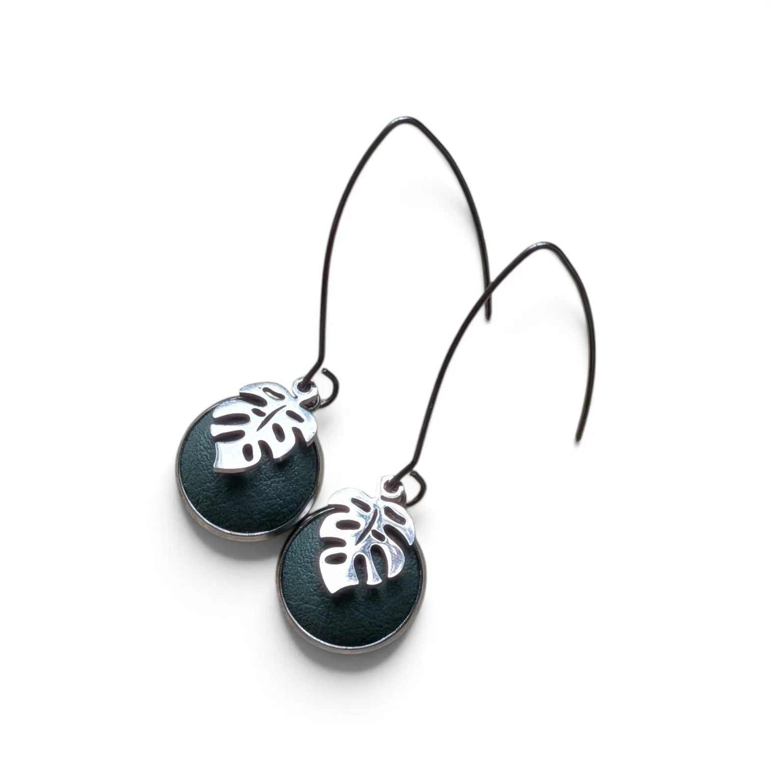 Long V shape drop earrings with monstera leaf charms