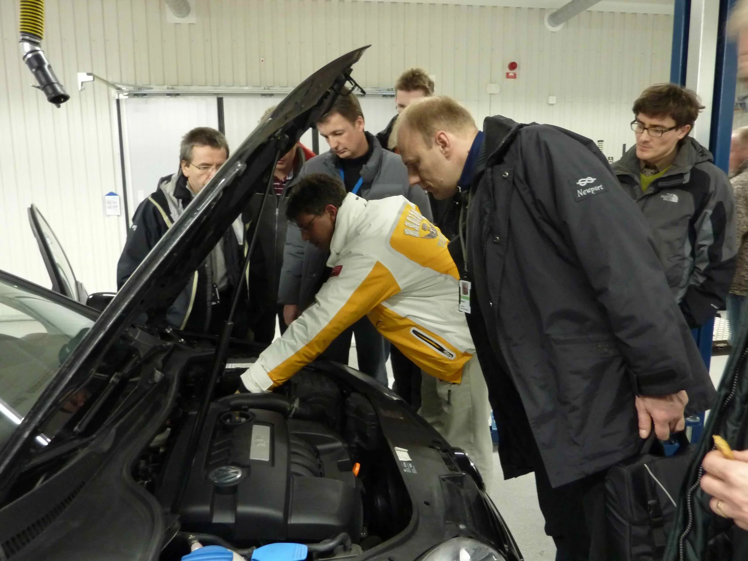 Dr. Thomas Leiber and team inspecting the prototype in a test vehicle