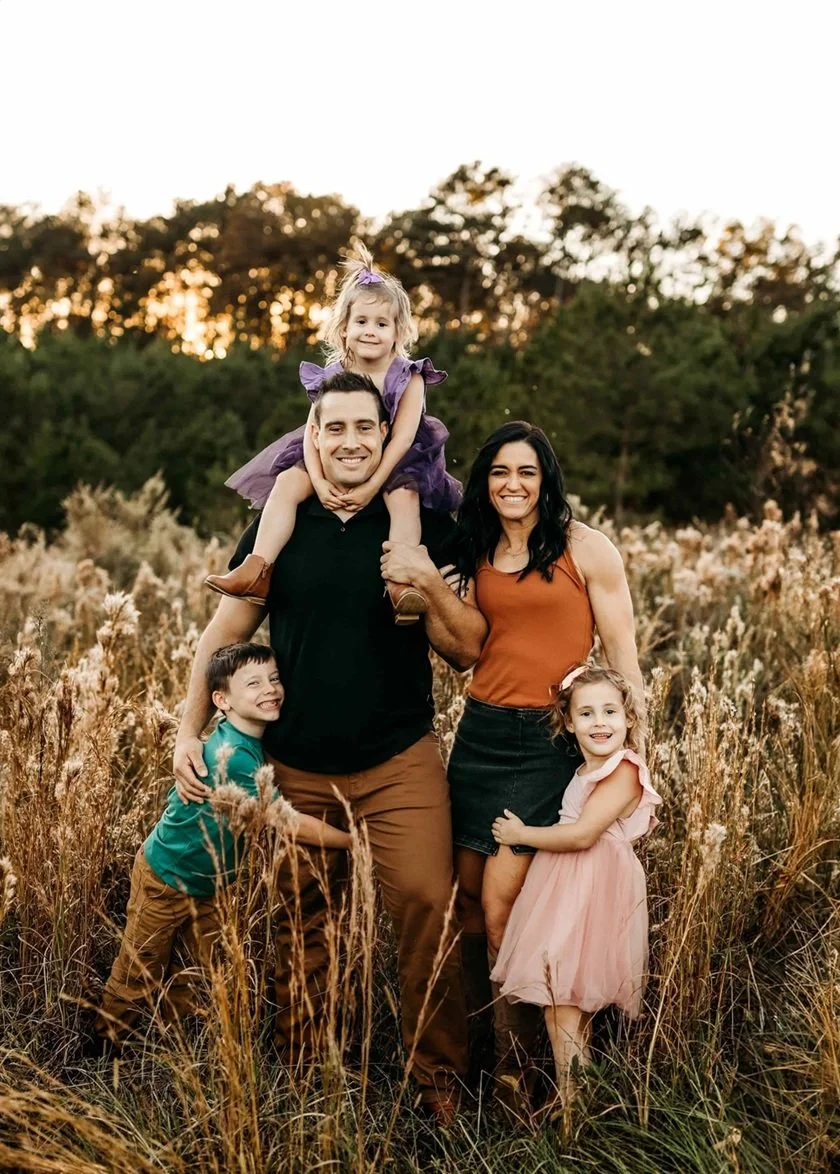 The PHNX Collective owners, Candace and Andrew Rape, with their family