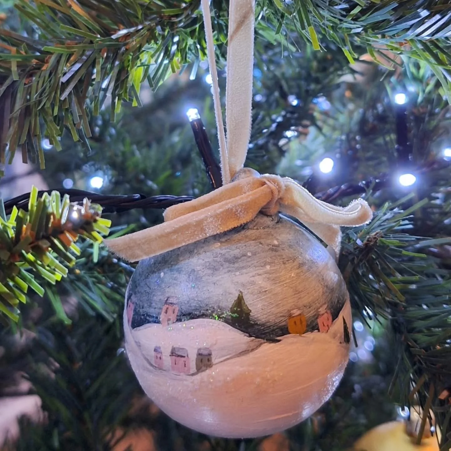 Handpainted Christmas bauble with winter scene