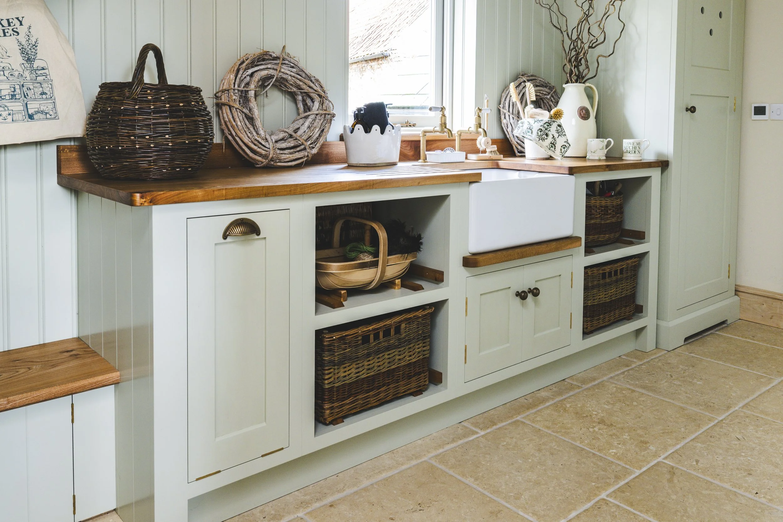 Painted base units with wicker basket drawers