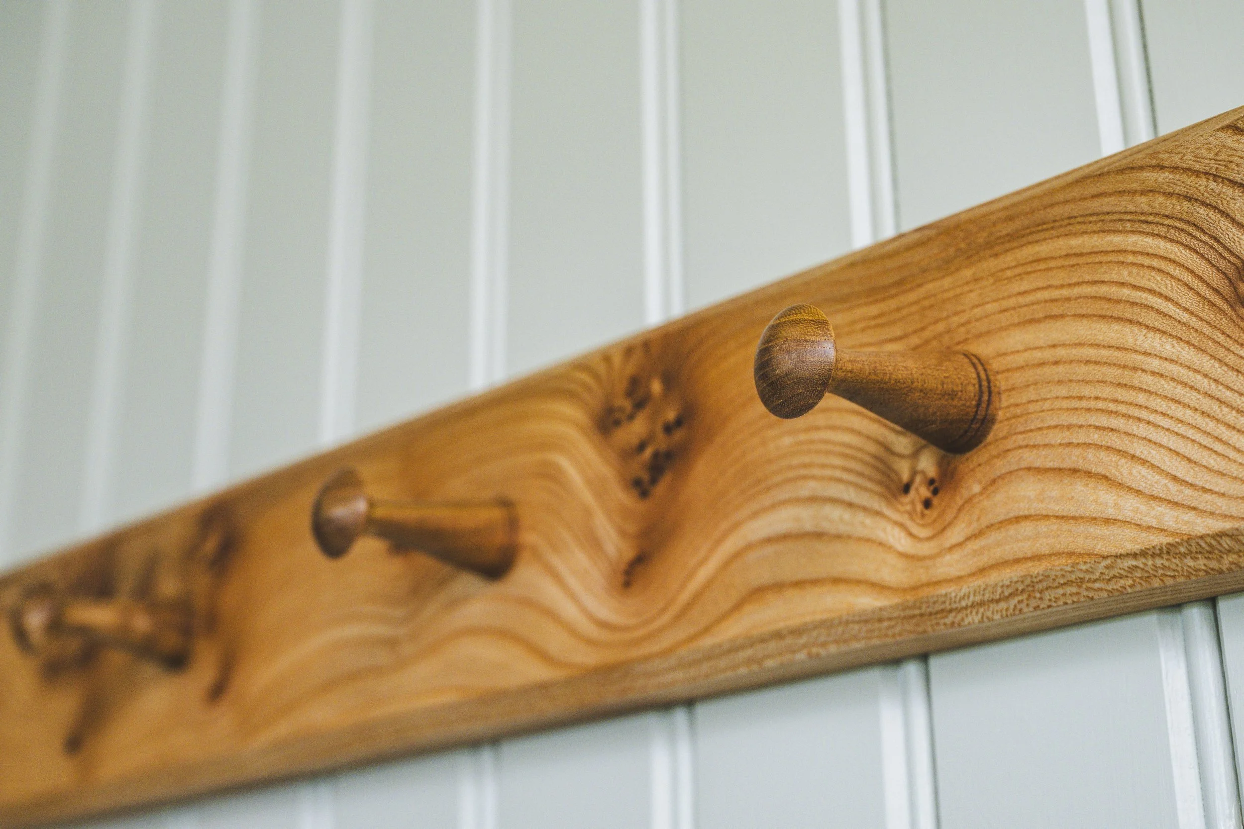 Hand made coat pegs for boot room