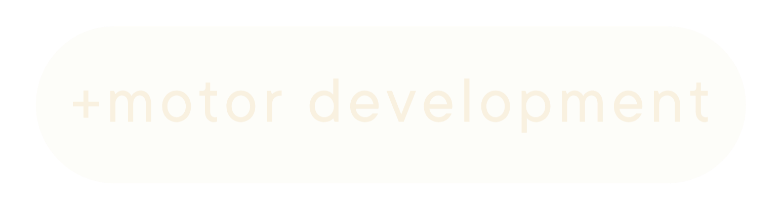Cream-colored horizontal capsule with "+motor development" embossed on it