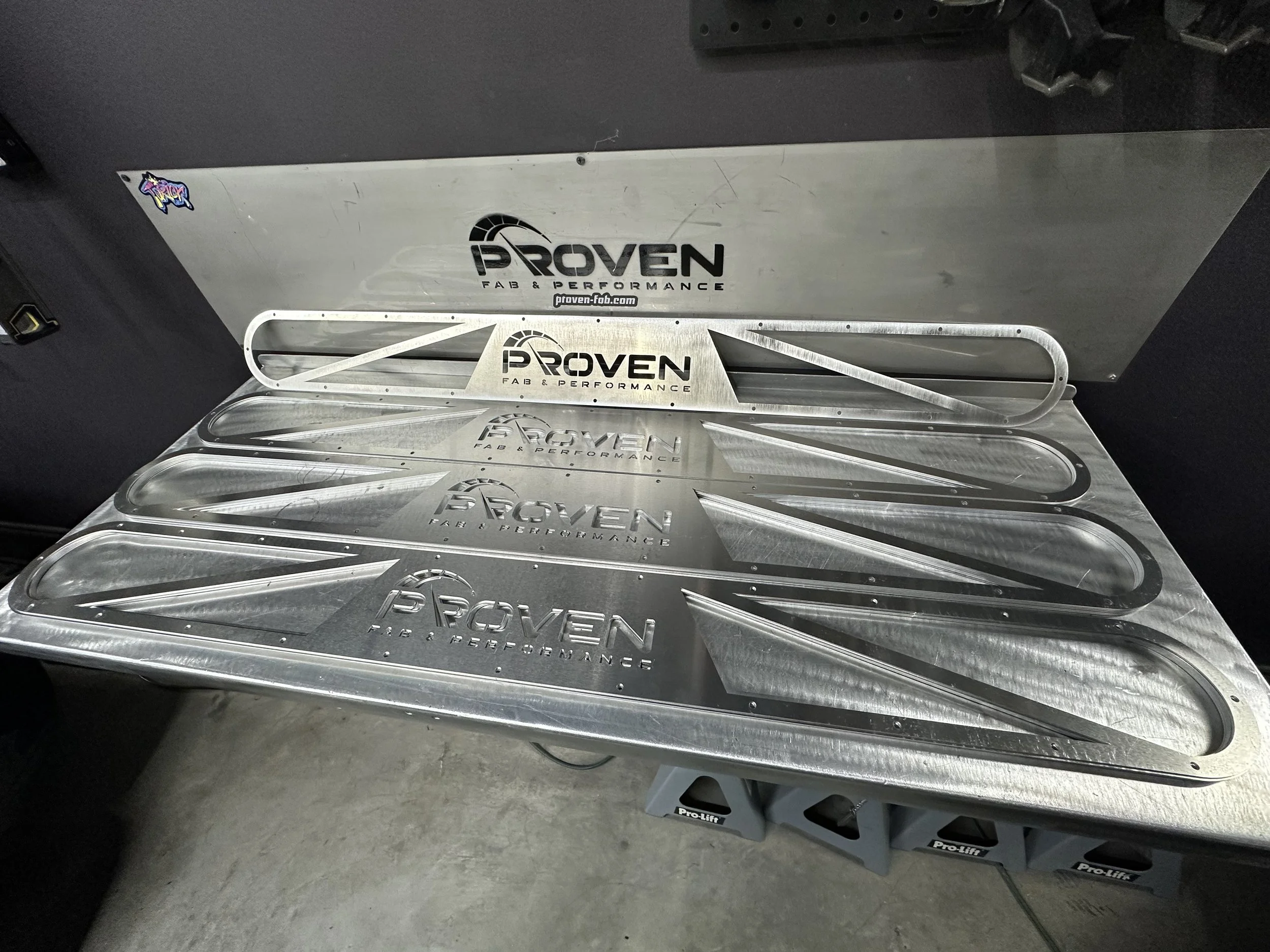 A set of metal performance parts with 