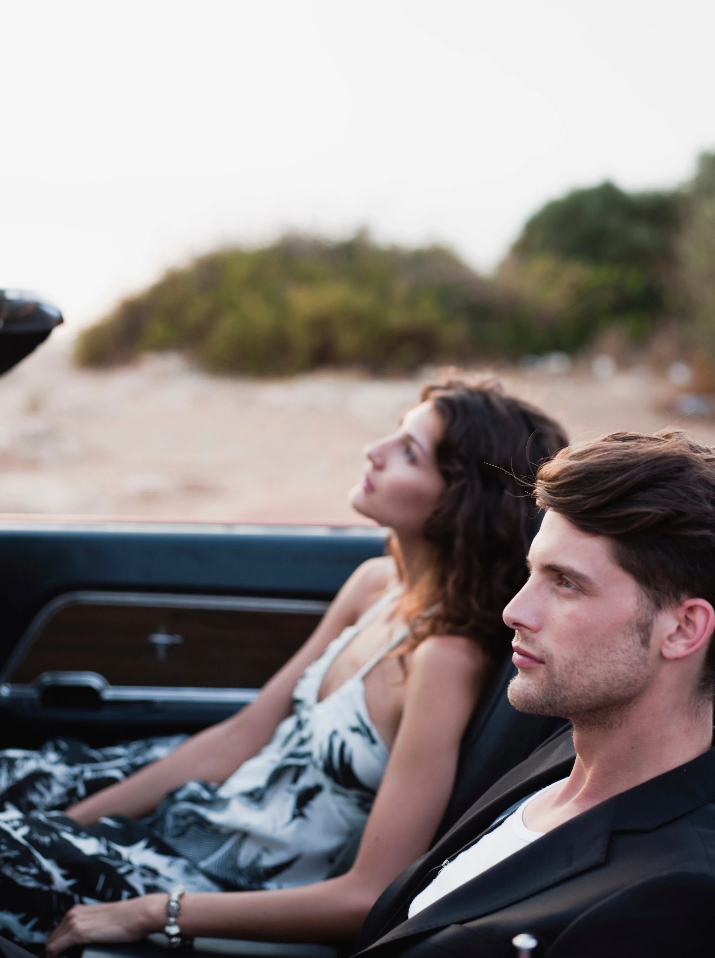 couple-sitting-in-front-of-car-2026-01-05-23-31-32-utc.jpg