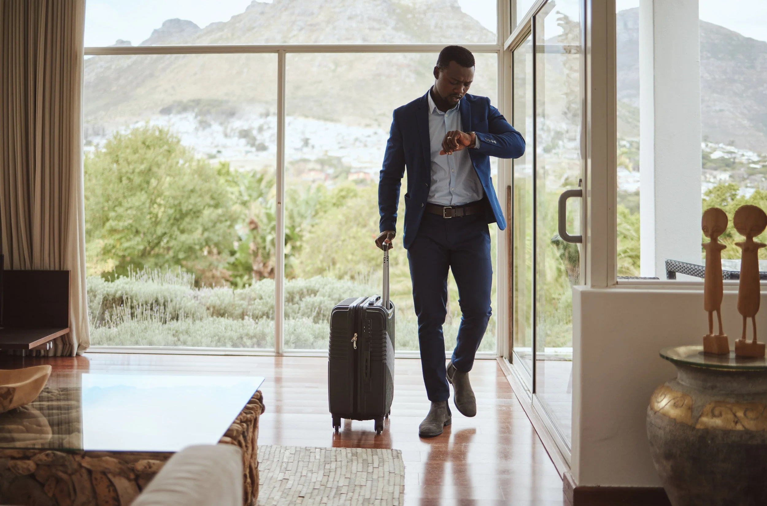 travel-business-and-black-man-reading-time-notif-2026-03-25-05-54-53-utc.jpg