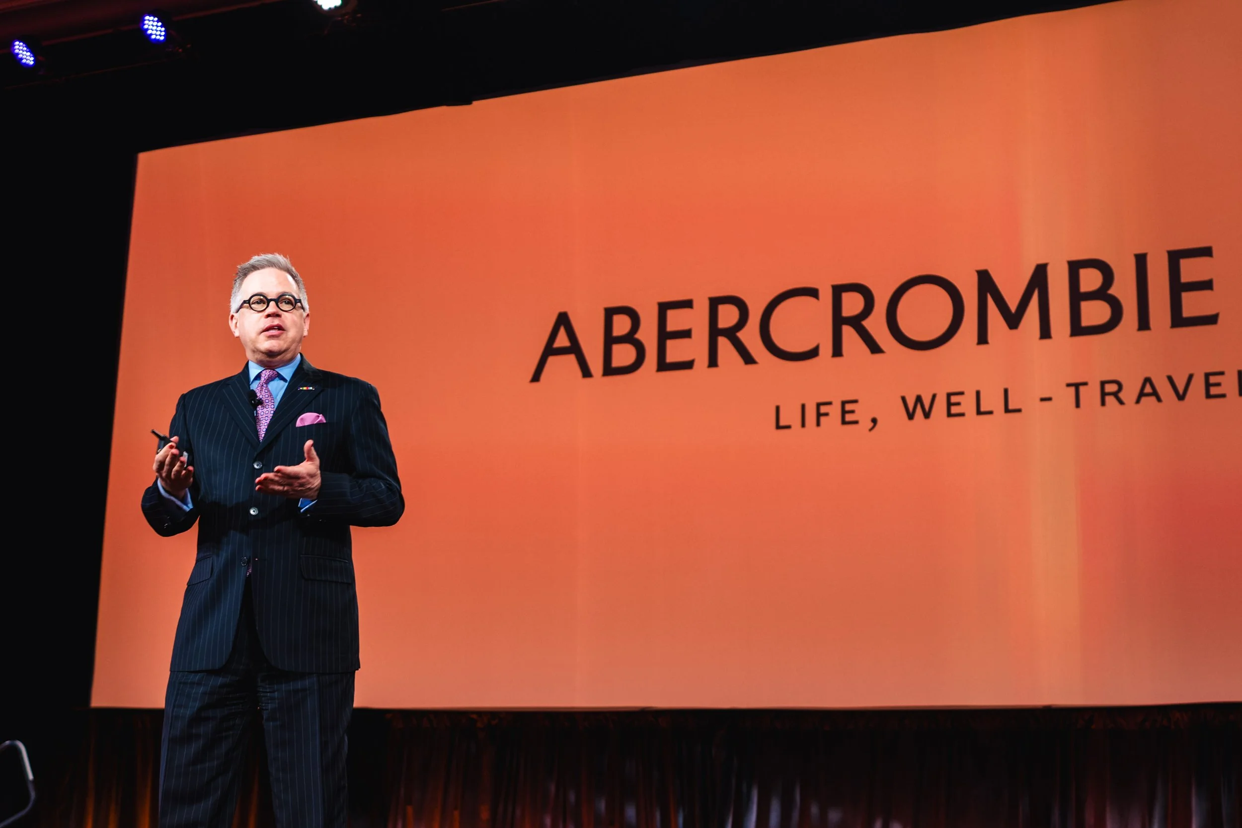 Executive speaking during corporate summit in Las Vegas