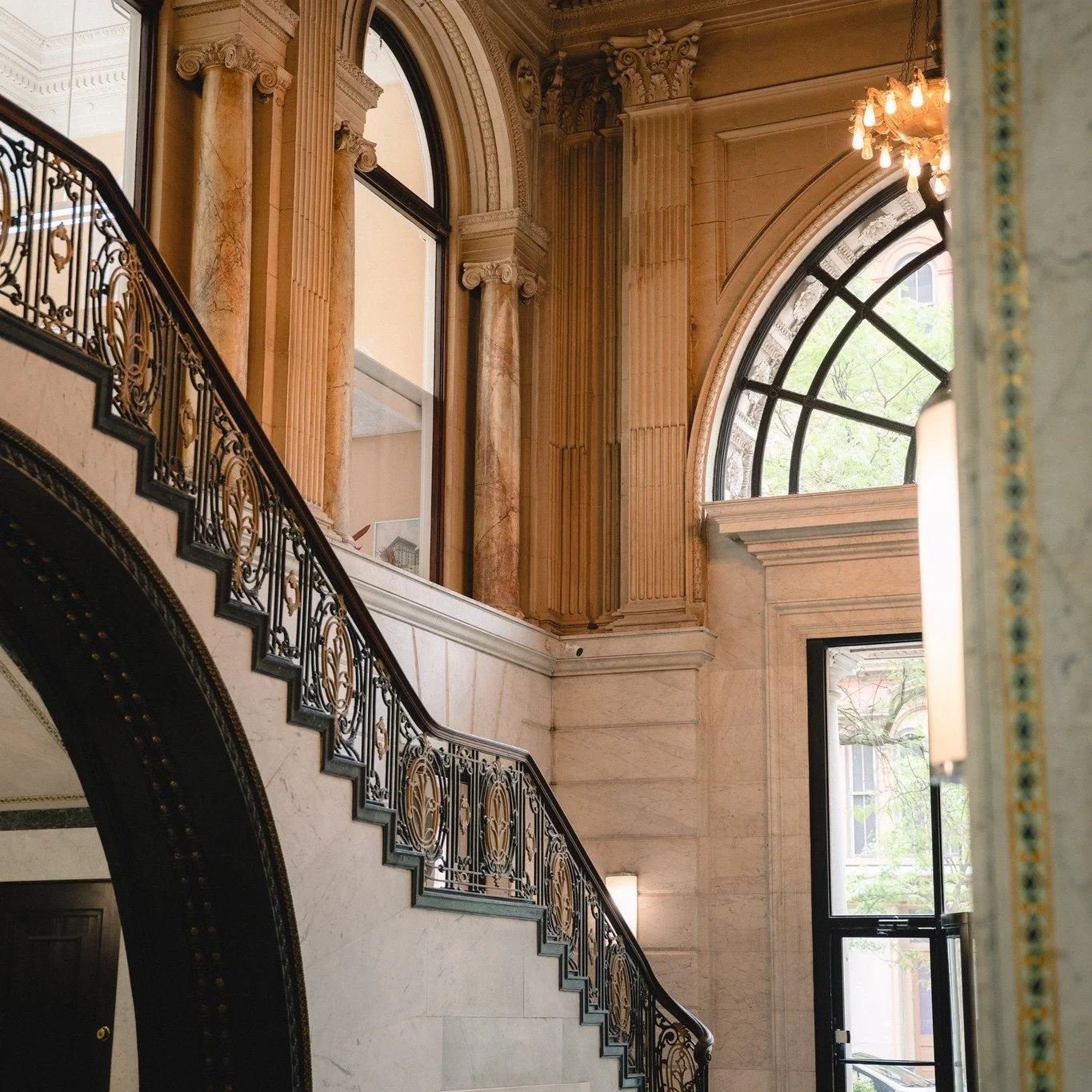 Step inside. The history gets even better.

There&rsquo;s something about this lobby that makes you slow down.

The marble staircase. The ornate ironwork. The soaring arched windows. The carved columns and intricate details that were designed to make