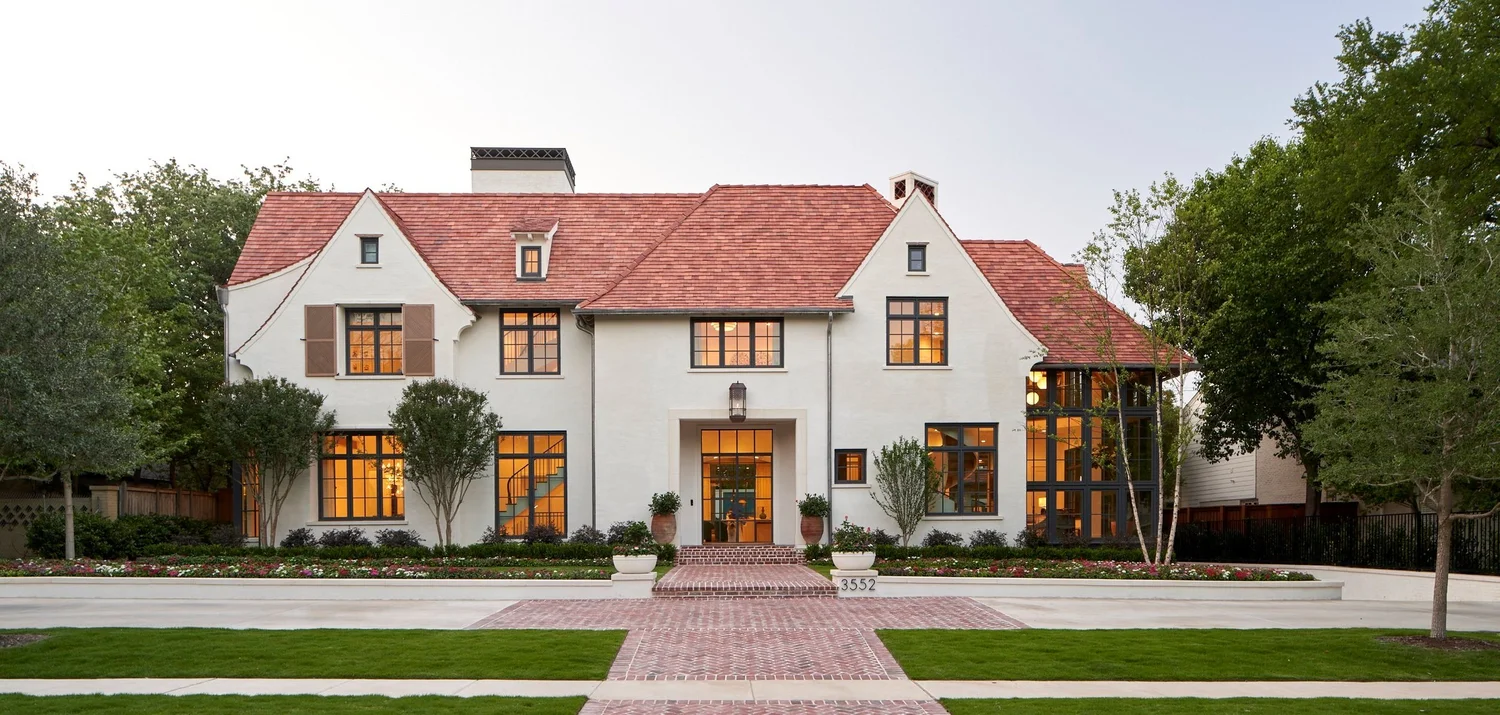 Marquette Residence, front elevation at dusk