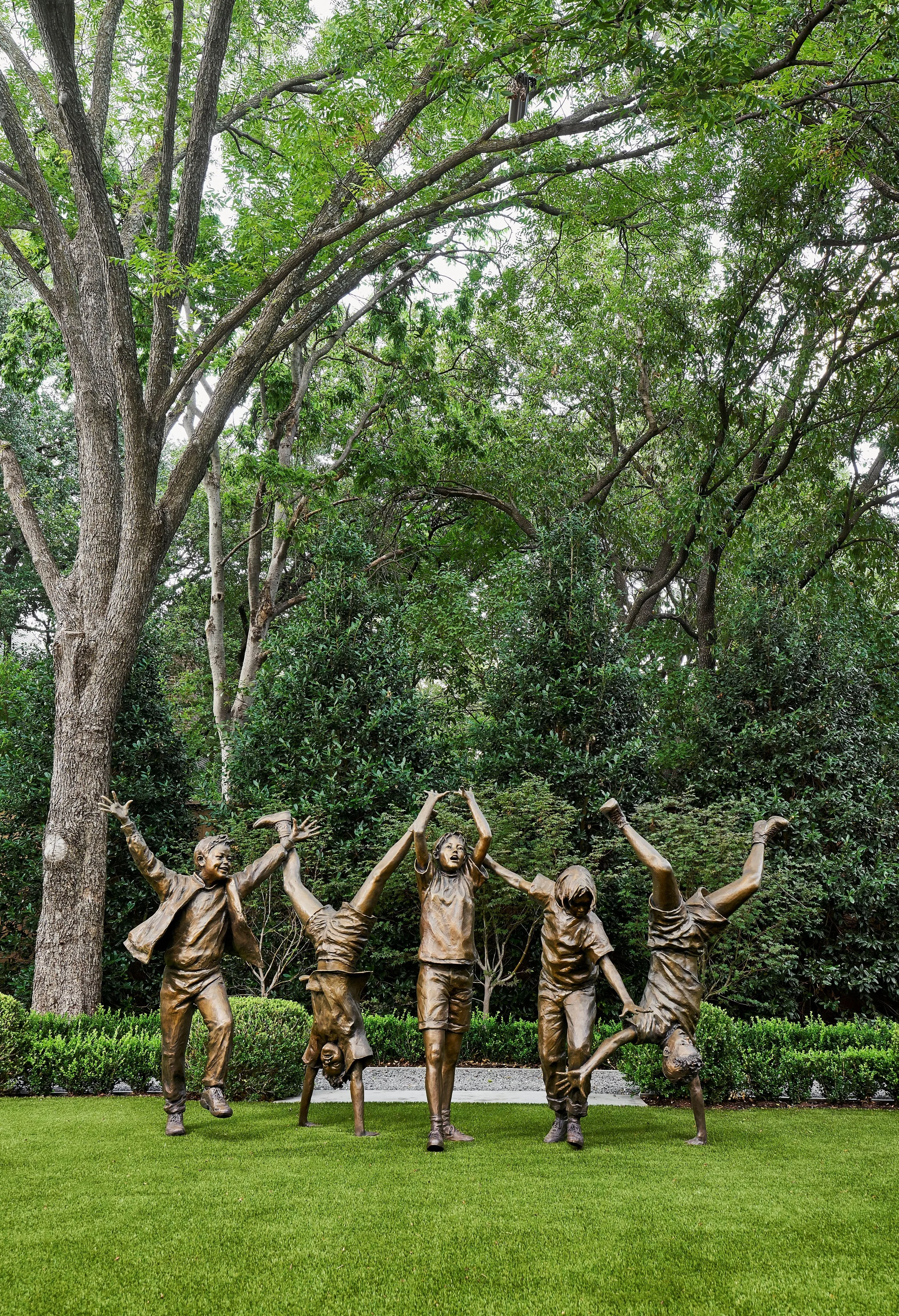 5931ParkLane_LLClark_0405kidsstatues.jpg
