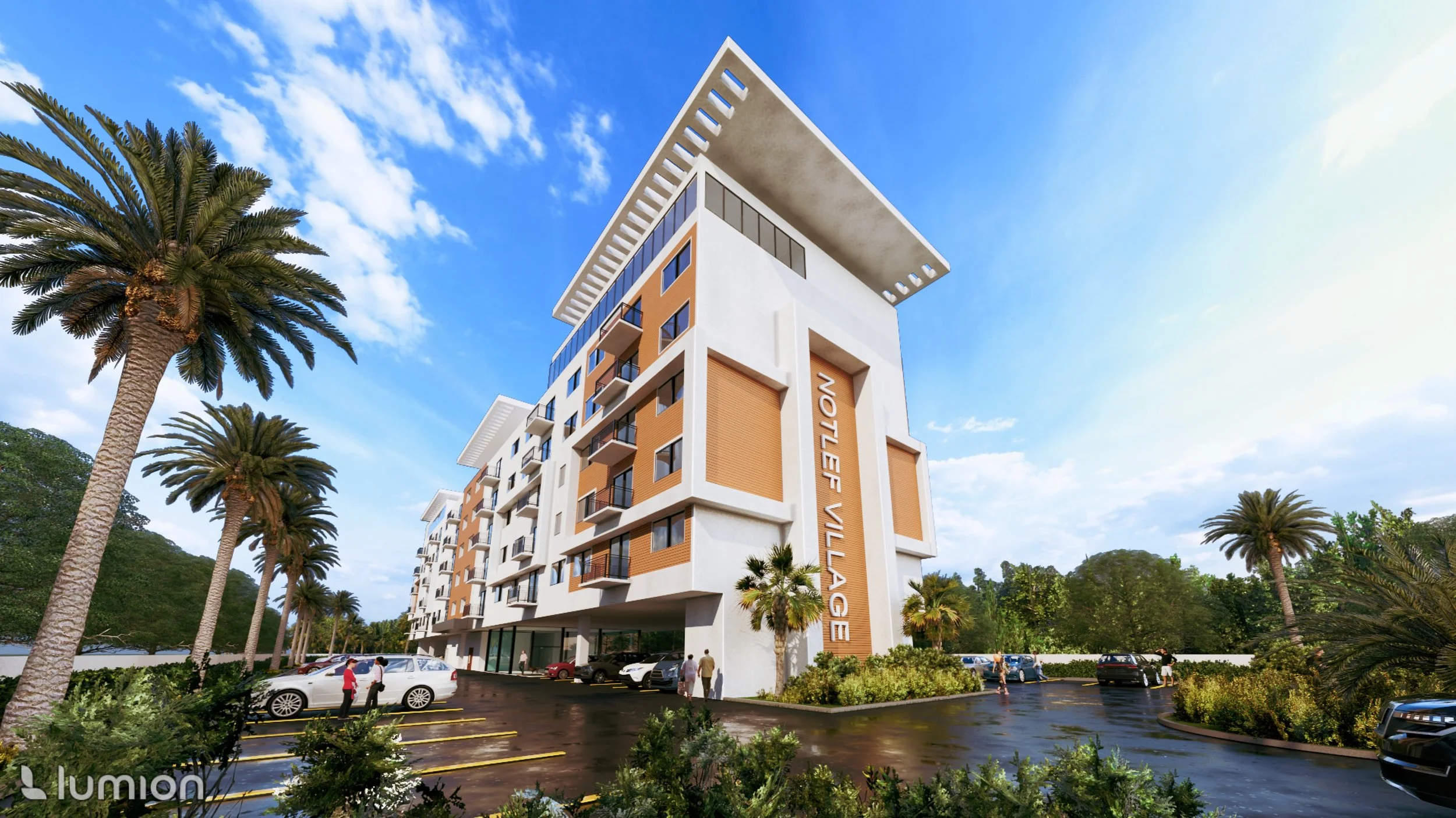 Modern multi-story hotel building with parking lot and palm trees in a sunny setting under a blue sky.