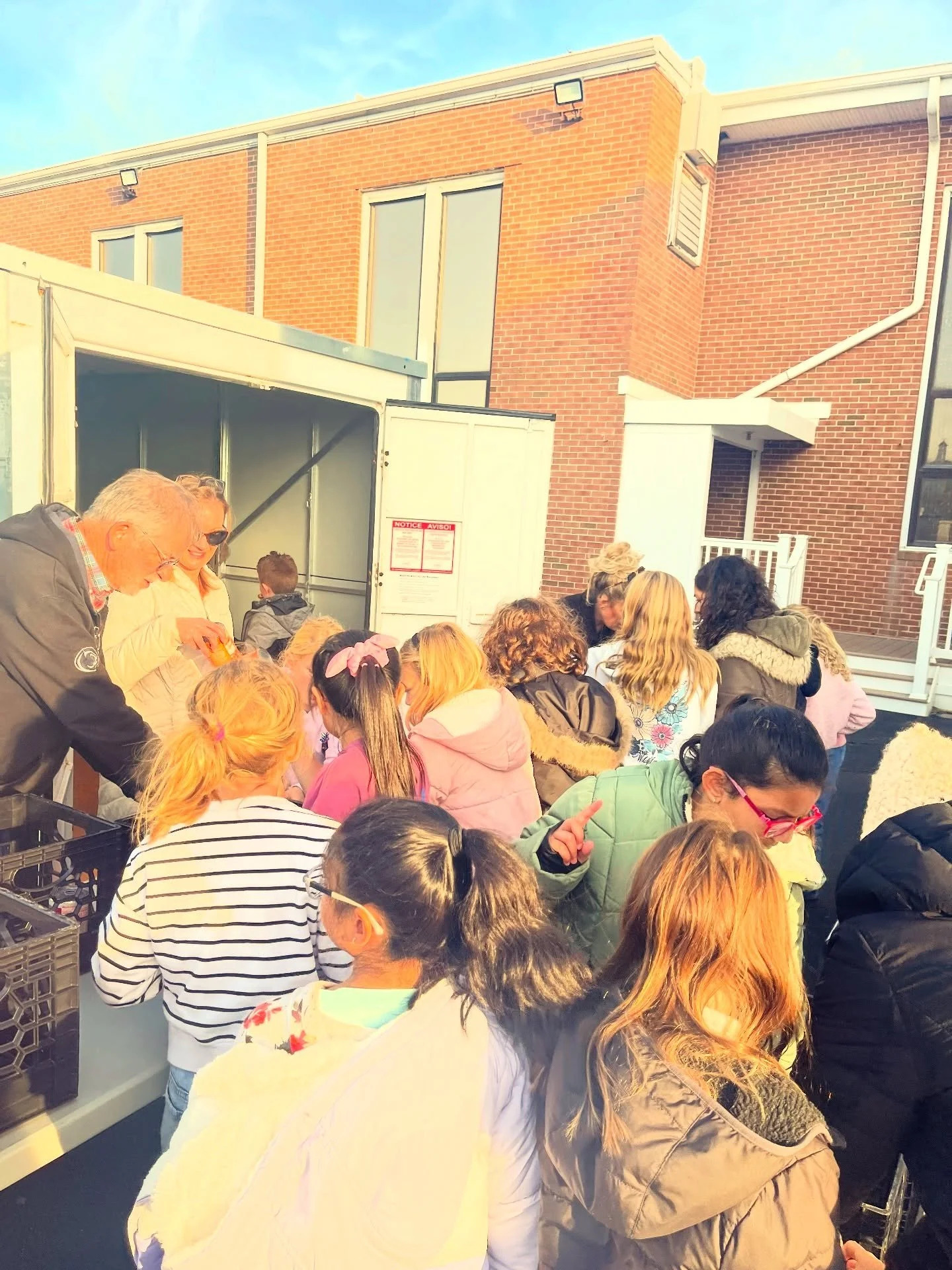 A Bus Full of Kindness: EJ Students, Girl Scouts, and Local Partners Make a Big Impact
