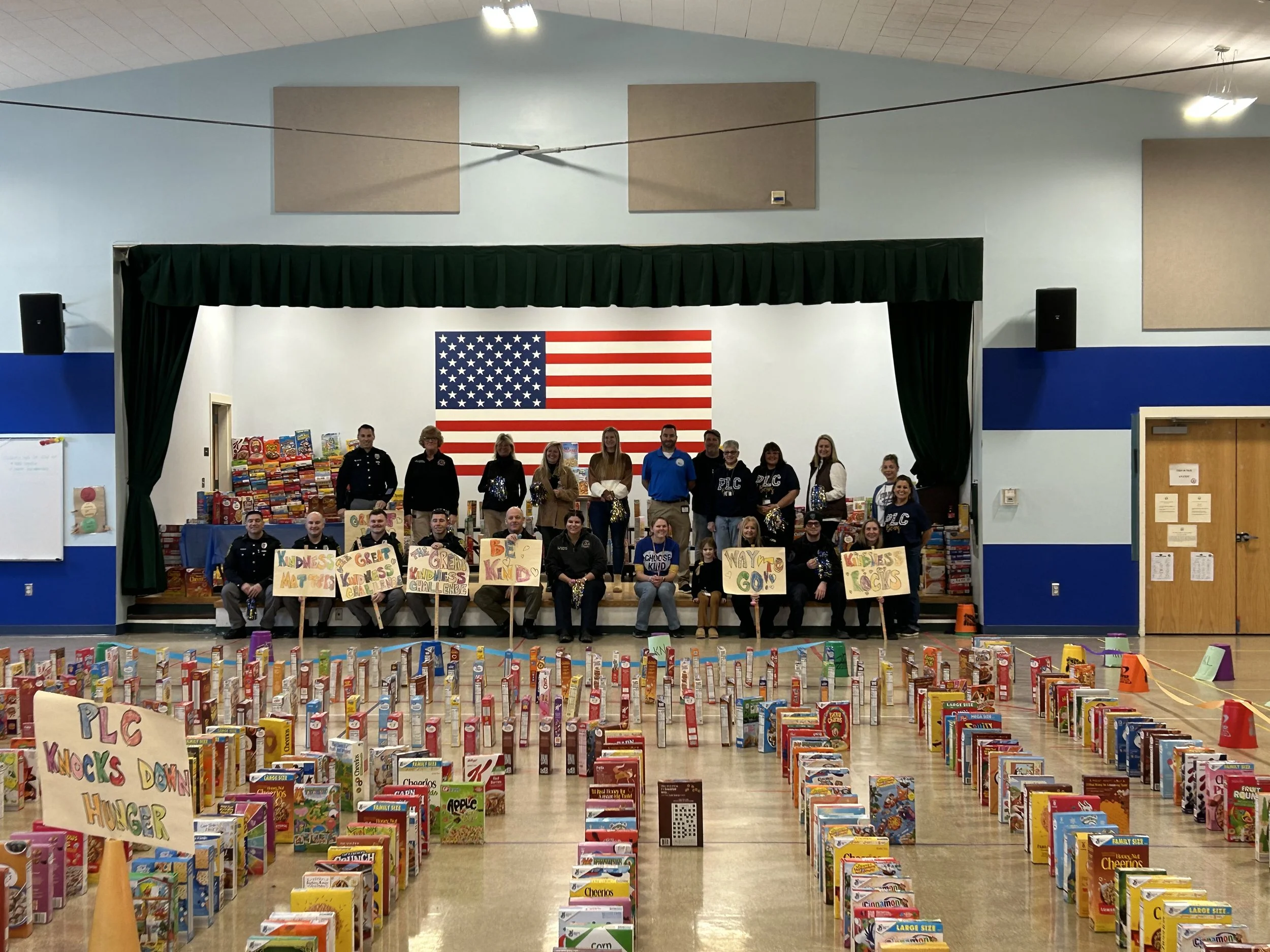 PLC Community Collects 1,473 Boxes of Cereal for St. Francis Food Pantry