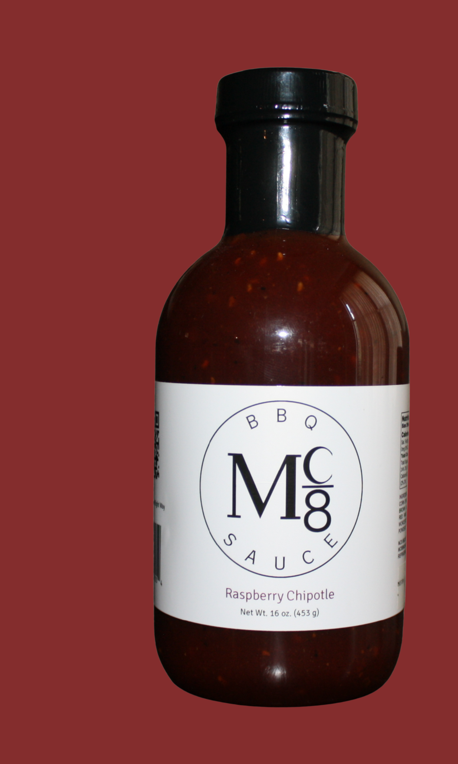 A bottle of Mc8 Raspberry Chipotle BBQ sauce.