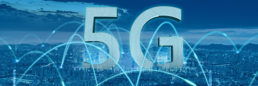 City skyline at dusk with large 5G and 5G network graphics overlay.