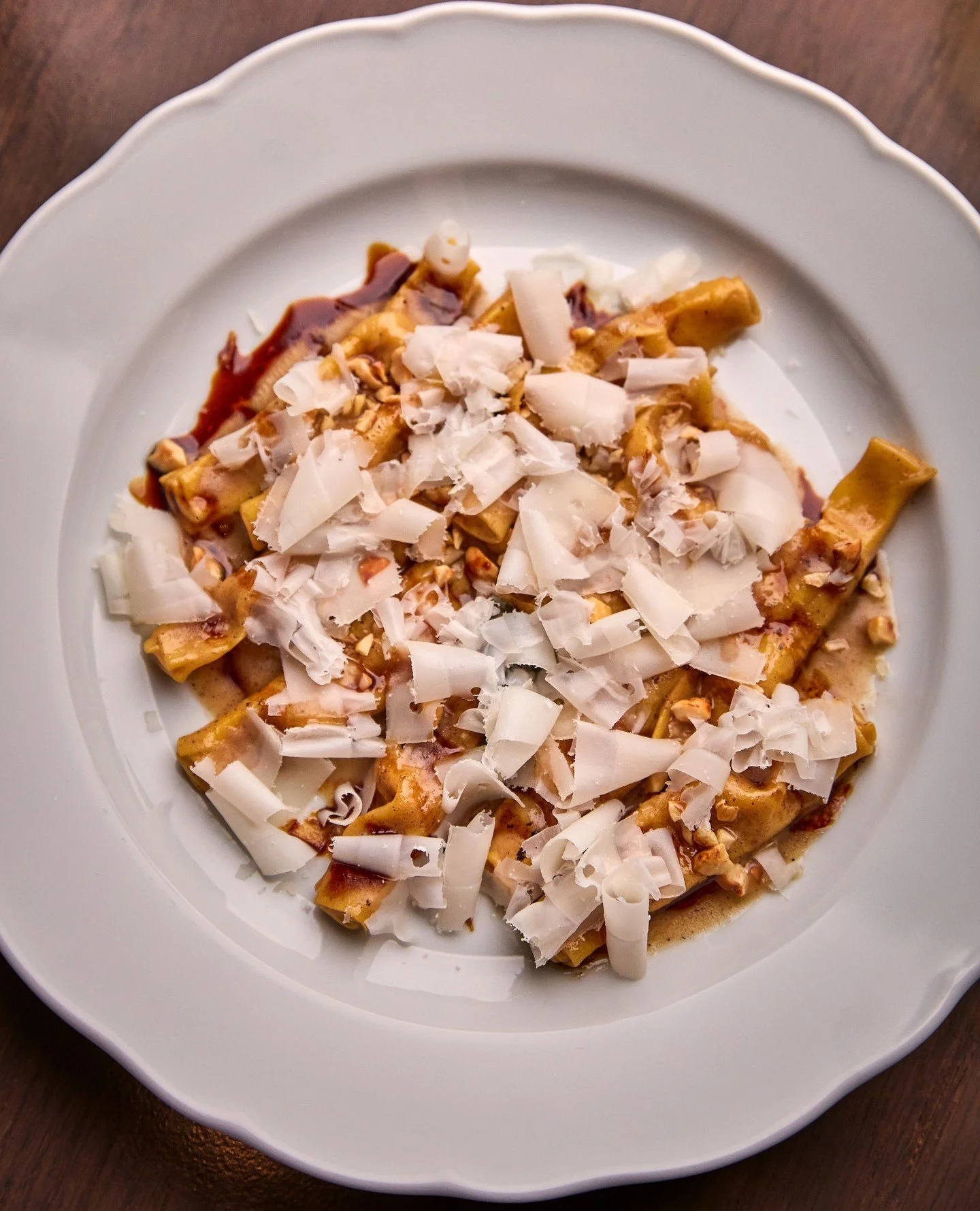 We welcome autumn to the table with our seasonal pasta dish. Kabocha Squash Caramelle with apple saba, hazelnut, and goat gouda.