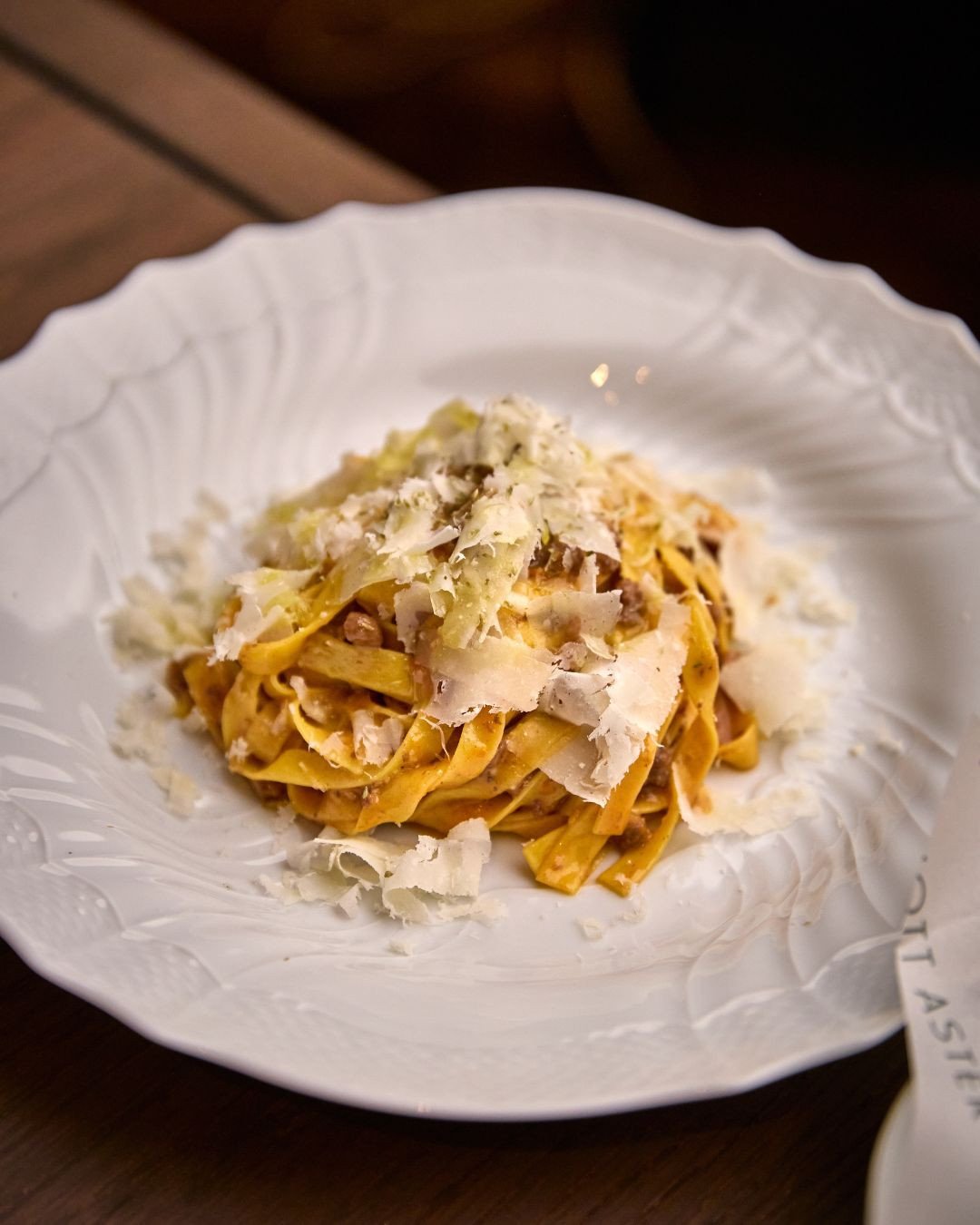 Imagine this: Tagliatelle Bolognese with freshly shaved Parmesan and a sprinkling of Sicilian Oregano, paired with memories around the table. ⁠
⁠
Link in bio to reserve.