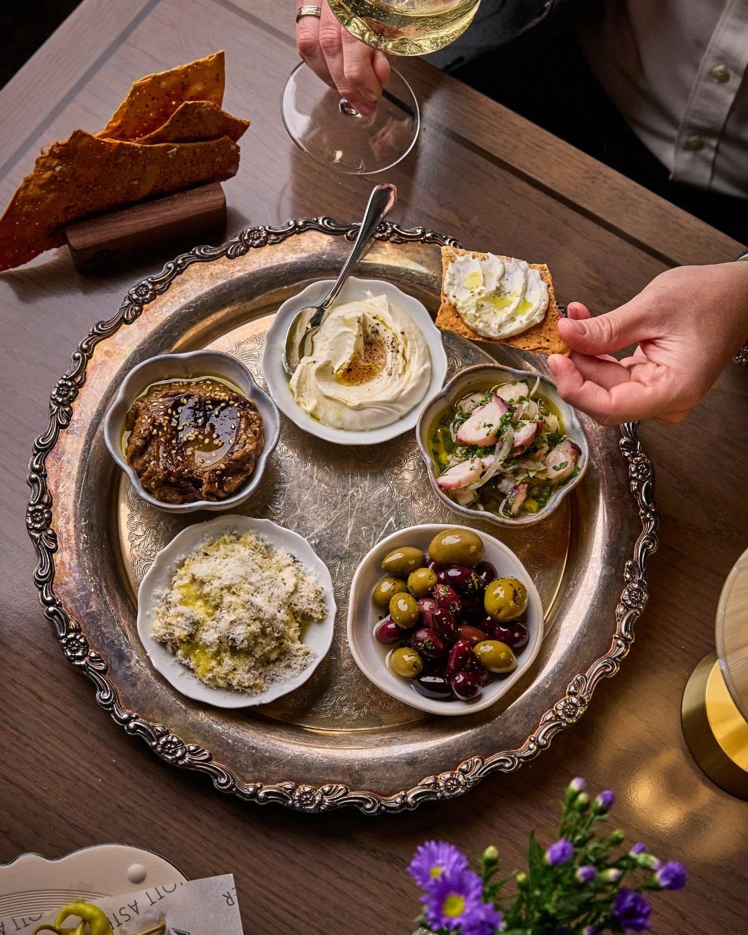 Our favorite kind of table spread features the Antipasti lineup served with fennel seed &amp; black pepper crackers.⁠
⁠
Charred Eggplant Spread⁠
Marinated Olives⁠
Whipped Ricotta⁠
Artichoke Dip⁠
Insalata di Mare