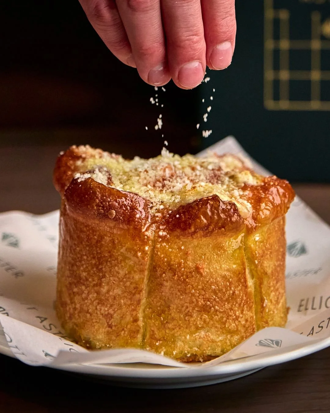 Focaccia "Pull Apart" | Fresh from the oven, finished with pecorino, Taleggio, and wildflower honey.