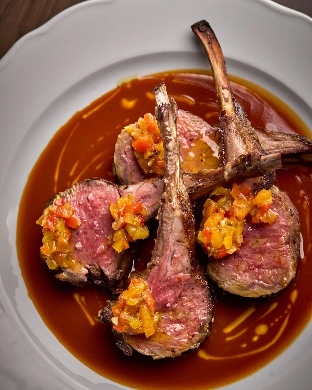 Rich and savory, our Grilled Rack of Lamb is paired with sweet pepper and lamb jus.