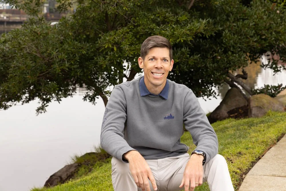 Cory Allen sitting outdoors