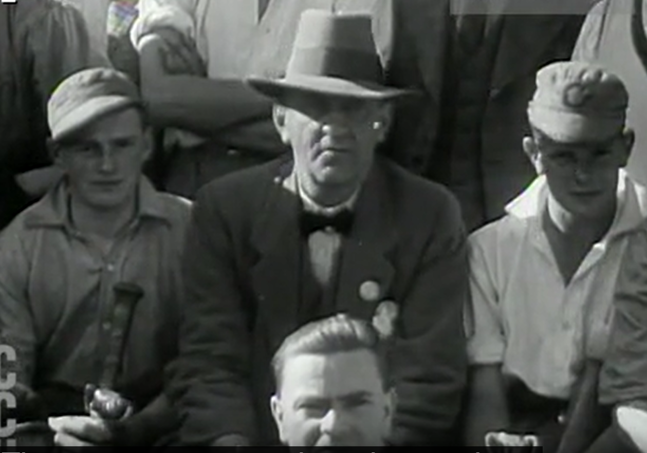 Fred Lewis in 1934 with some of his Chipping Norton baseball players. Still from Movietone News outtakes, https://digital.tcl.sc.edu/digital/collection/MVTN/id/637
