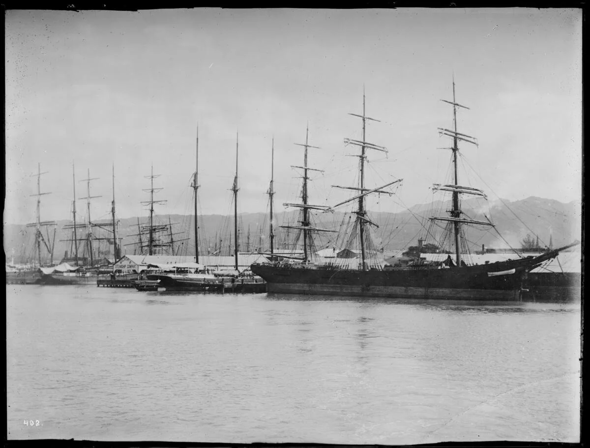 Sailing vessels at wharf in Honolulu harbor, ca.1892-1907. Digital Public Library of America. Public Domain.