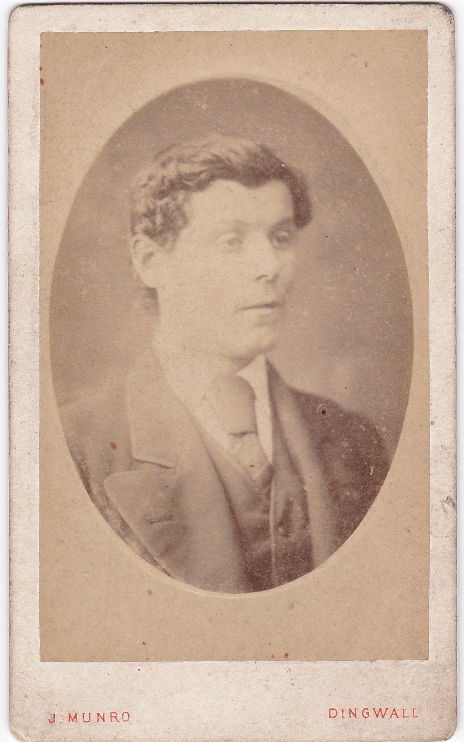 Young men of the town. Studio portrait of a Dingwall resident, c. 1890, cabinet card, photographer John Munro. Author's own collection.